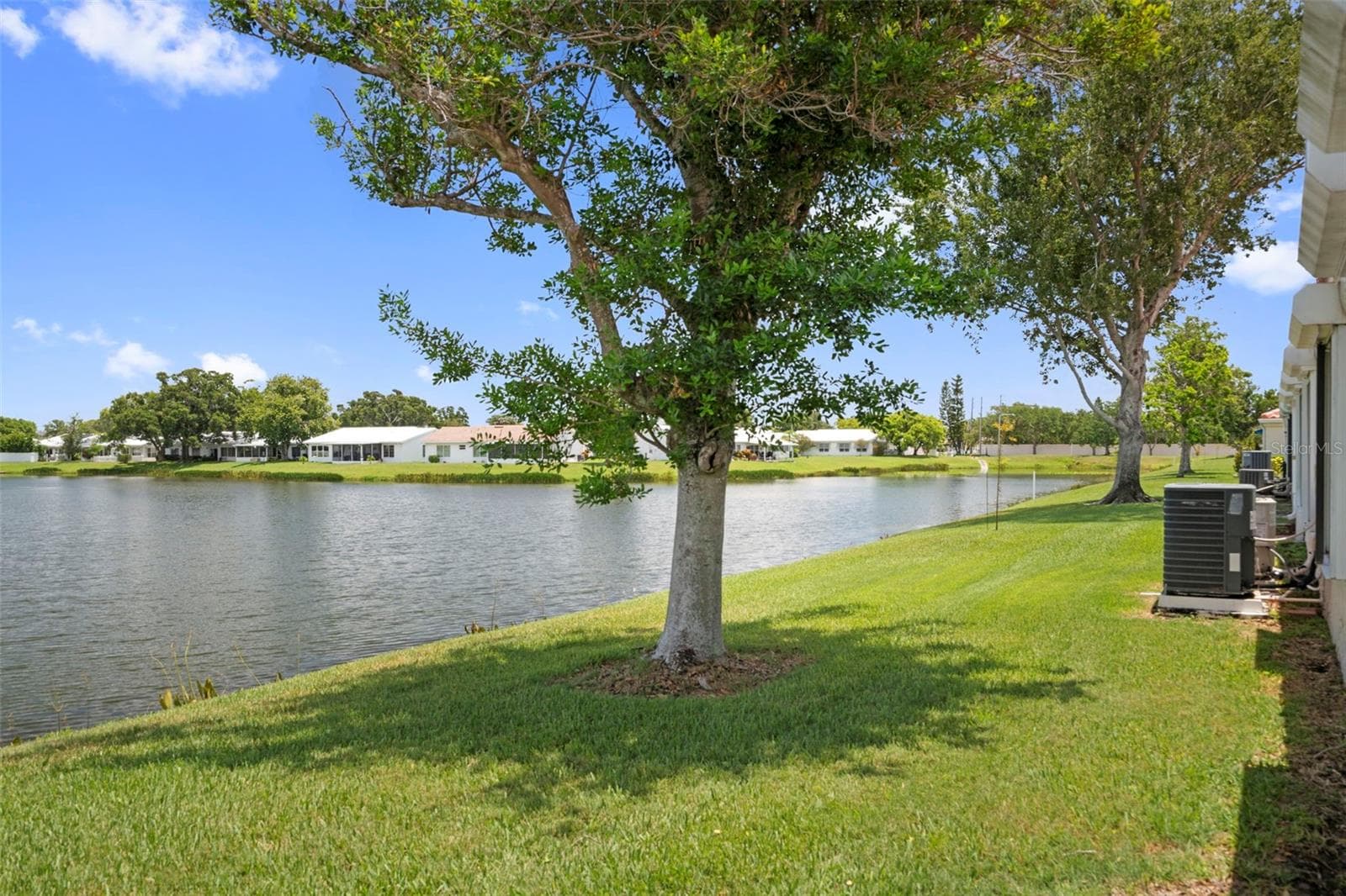 View of pond in rear - 4109 89TH AVE N, PINELLAS PARK