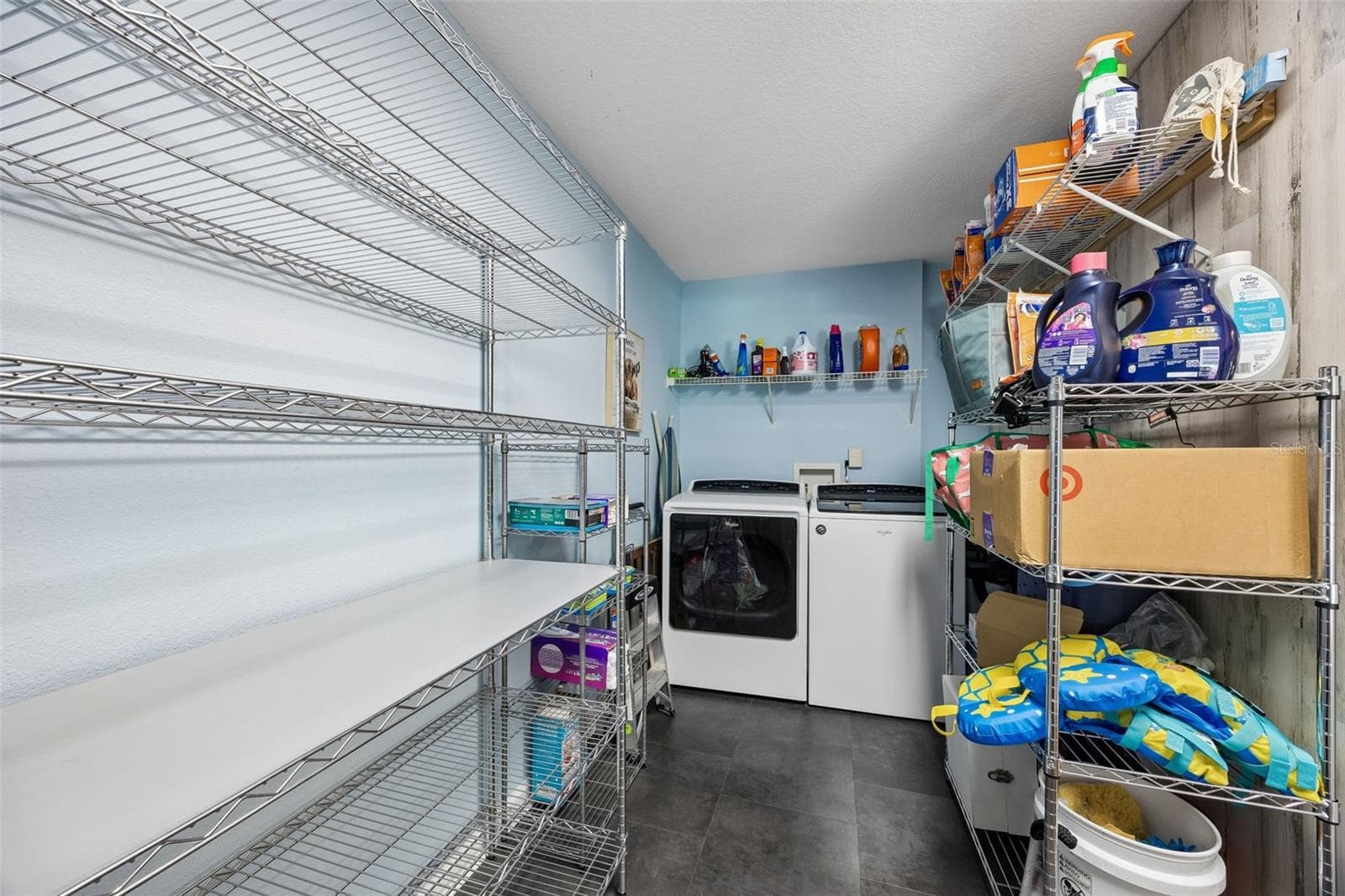 Includes a laundry area with storage space - 134 BOWFIN DR, PALATKA