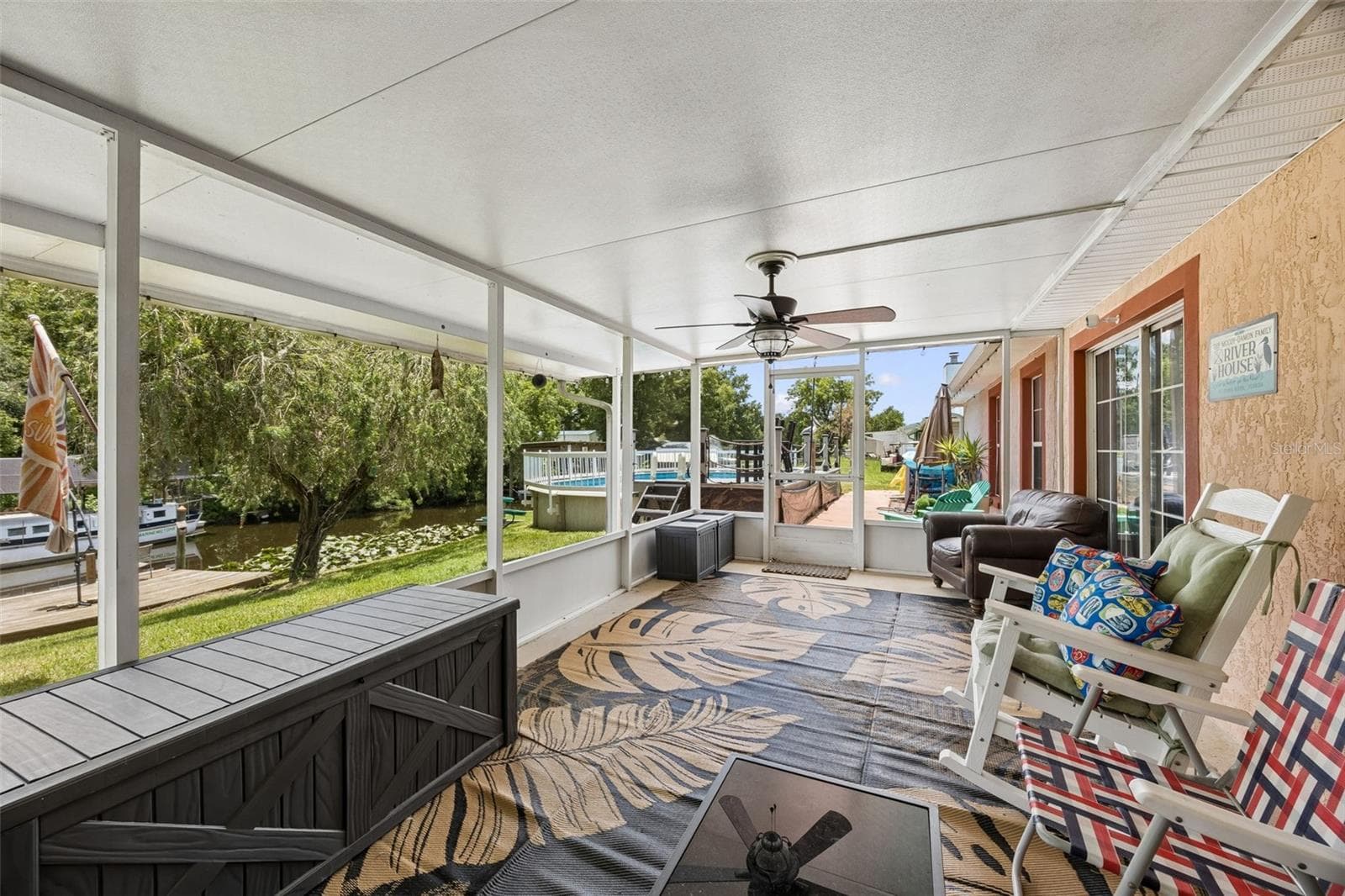 The screened porch - 134 BOWFIN DR, PALATKA