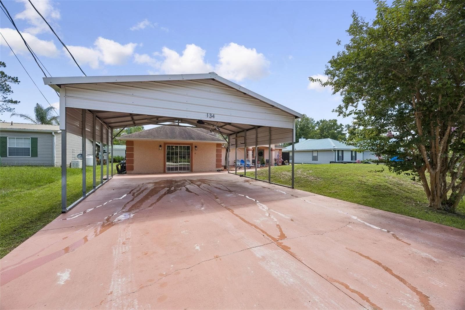 Under cover parking is available for four vehicles - 134 BOWFIN DR, PALATKA