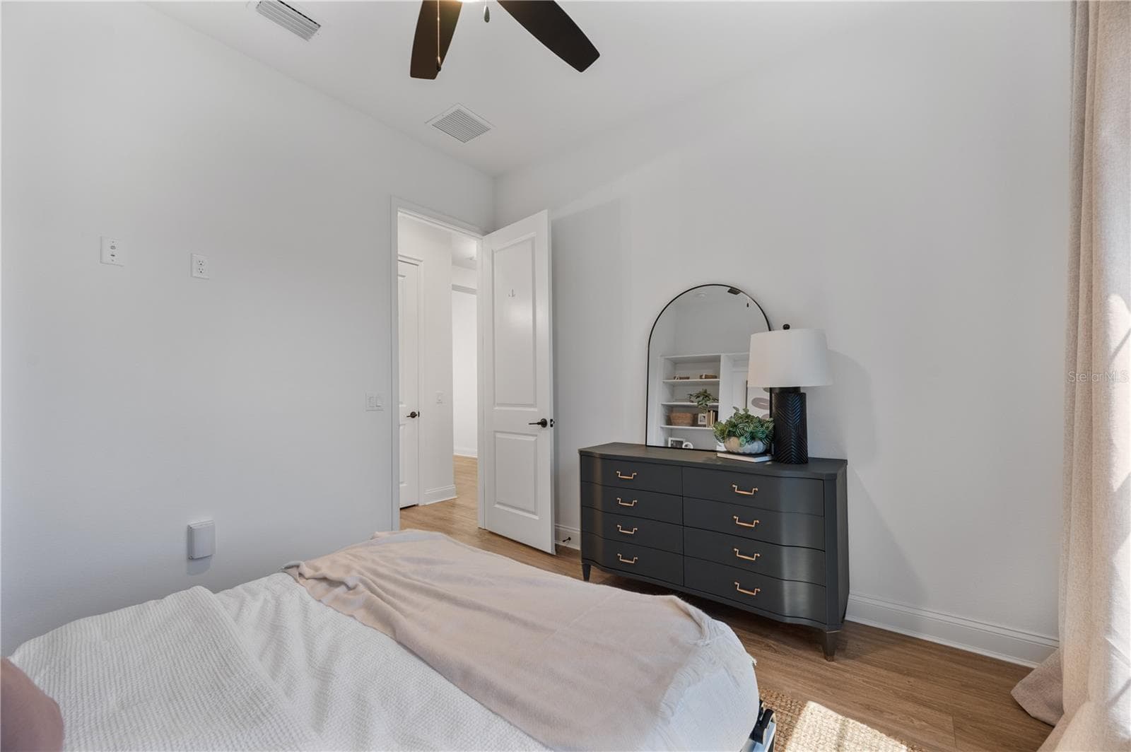 Custom built Murphy queen bed at front of home with built in storage system - 2403 DERBYSHIRE AVE, LAKELAND