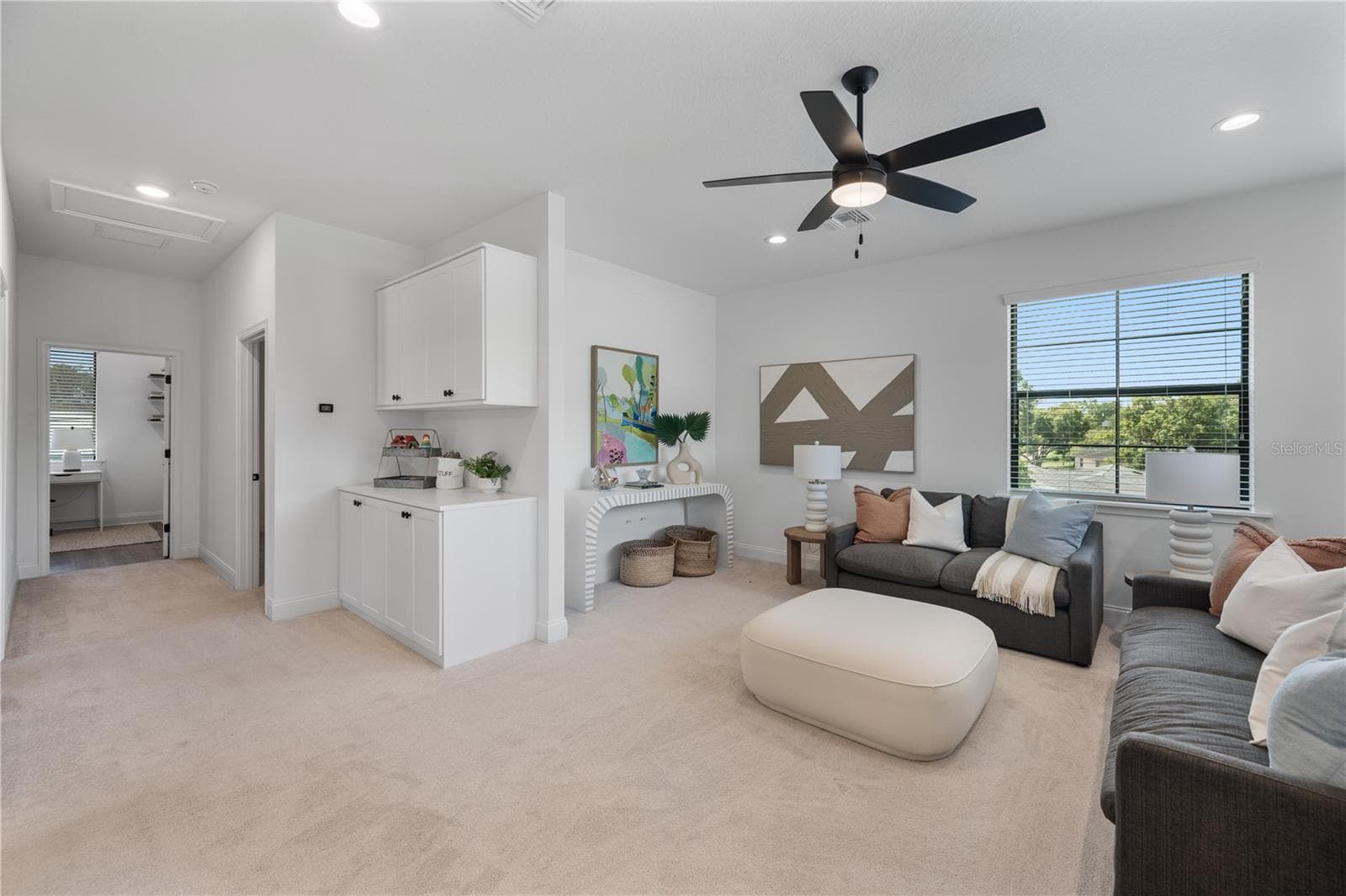 Upstairs loft that is pre-plumbed for a wet bar or can be drywalled in for an additional upstairs bedroom - 2403 DERBYSHIRE AVE, LAKELAND
