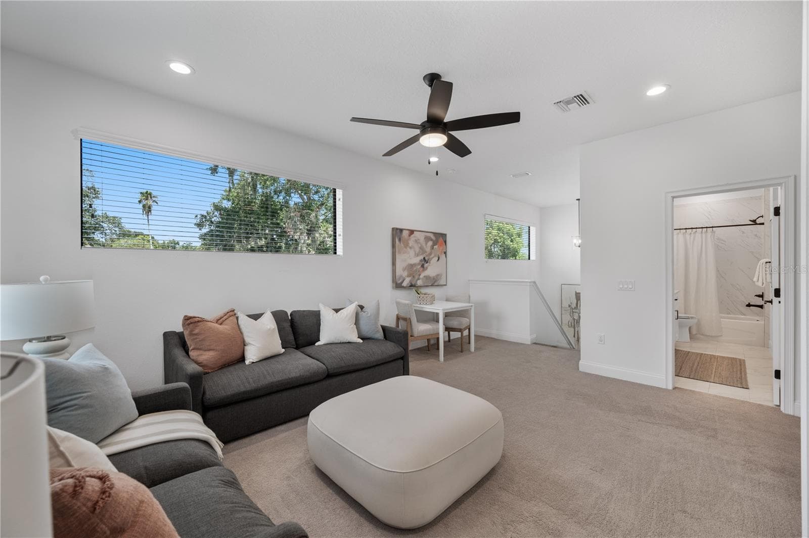 Upstairs loft that is pre-plumbed for a wet bar or can be drywalled in for an additional upstairs bedroom - 2403 DERBYSHIRE AVE, LAKELAND