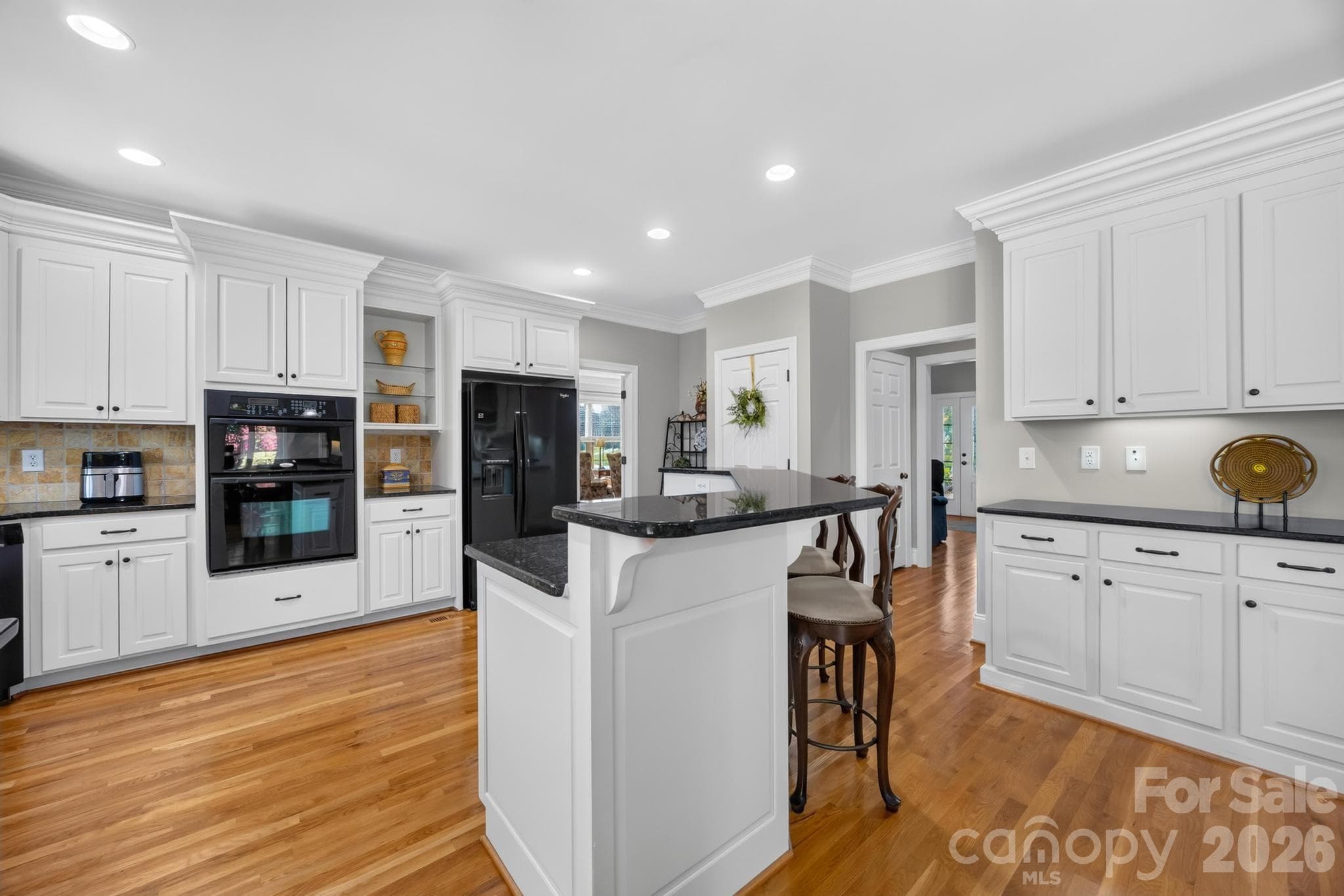 Kitchen- island with bar top - 105 Mandarin Drive, Mooresville