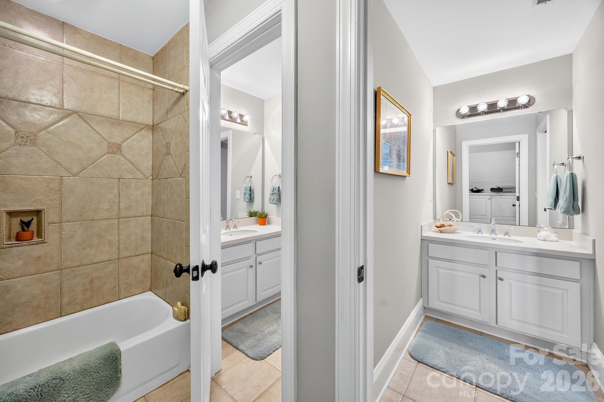 Secondary Bathroom with separate vanities and tile flooring - 105 Mandarin Drive, Mooresville