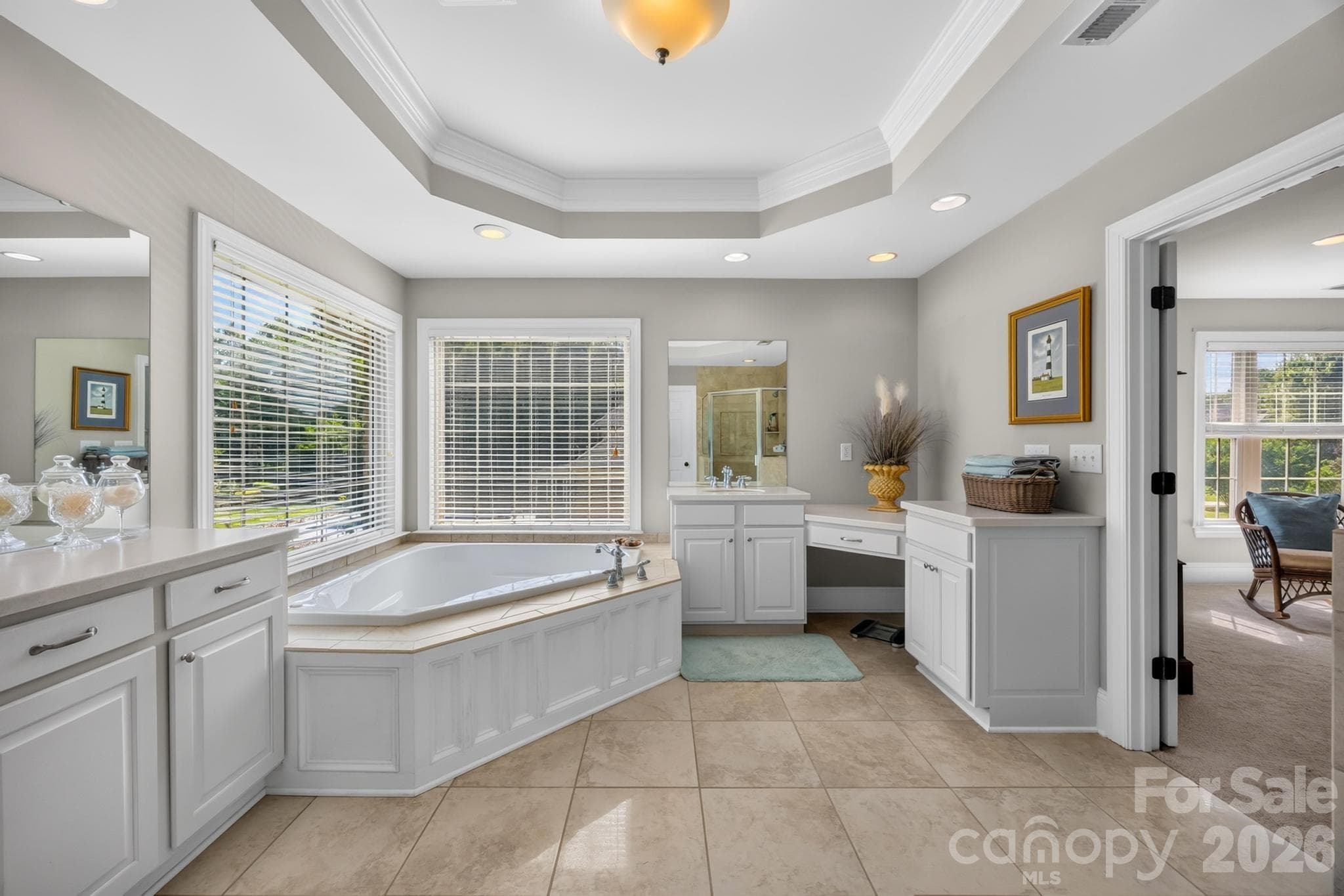 Separate dual vanities, garden tub, and lots of natural light - 105 Mandarin Drive, Mooresville
