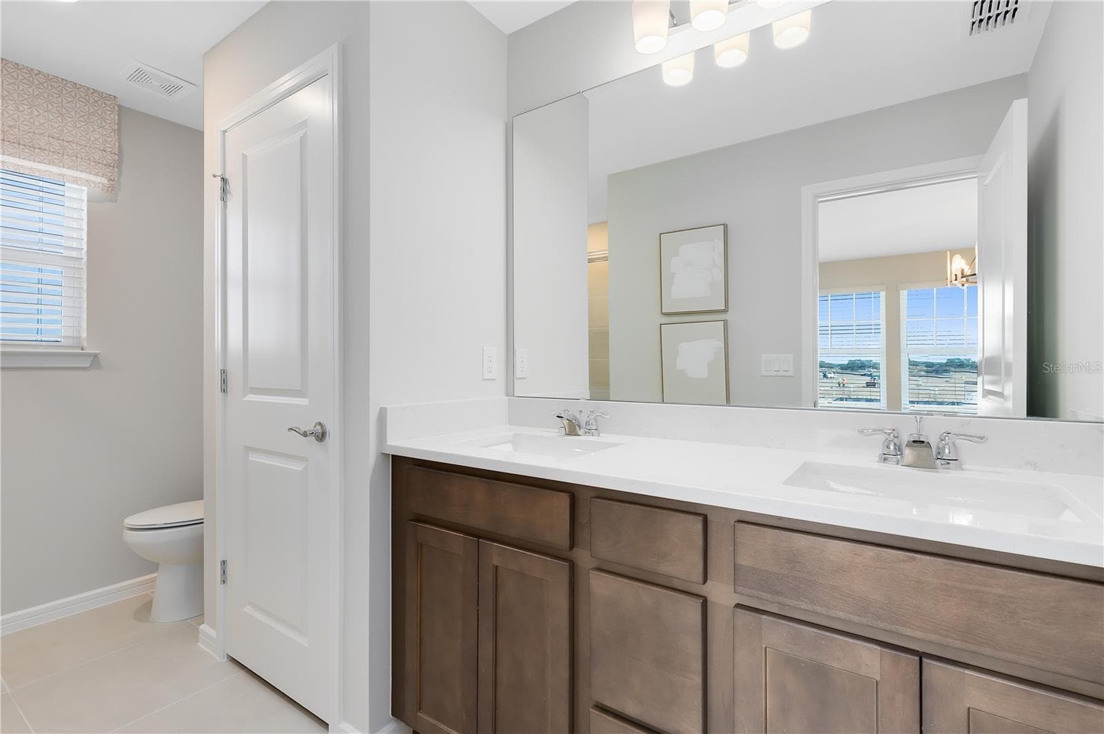 Model Home Design Only. Pictures and furnishings are for illustrative purposes only. Elevations, colors and options may vary. Furniture is for model home staging only. - 10674 EVENING STAR STREET, ORLANDO