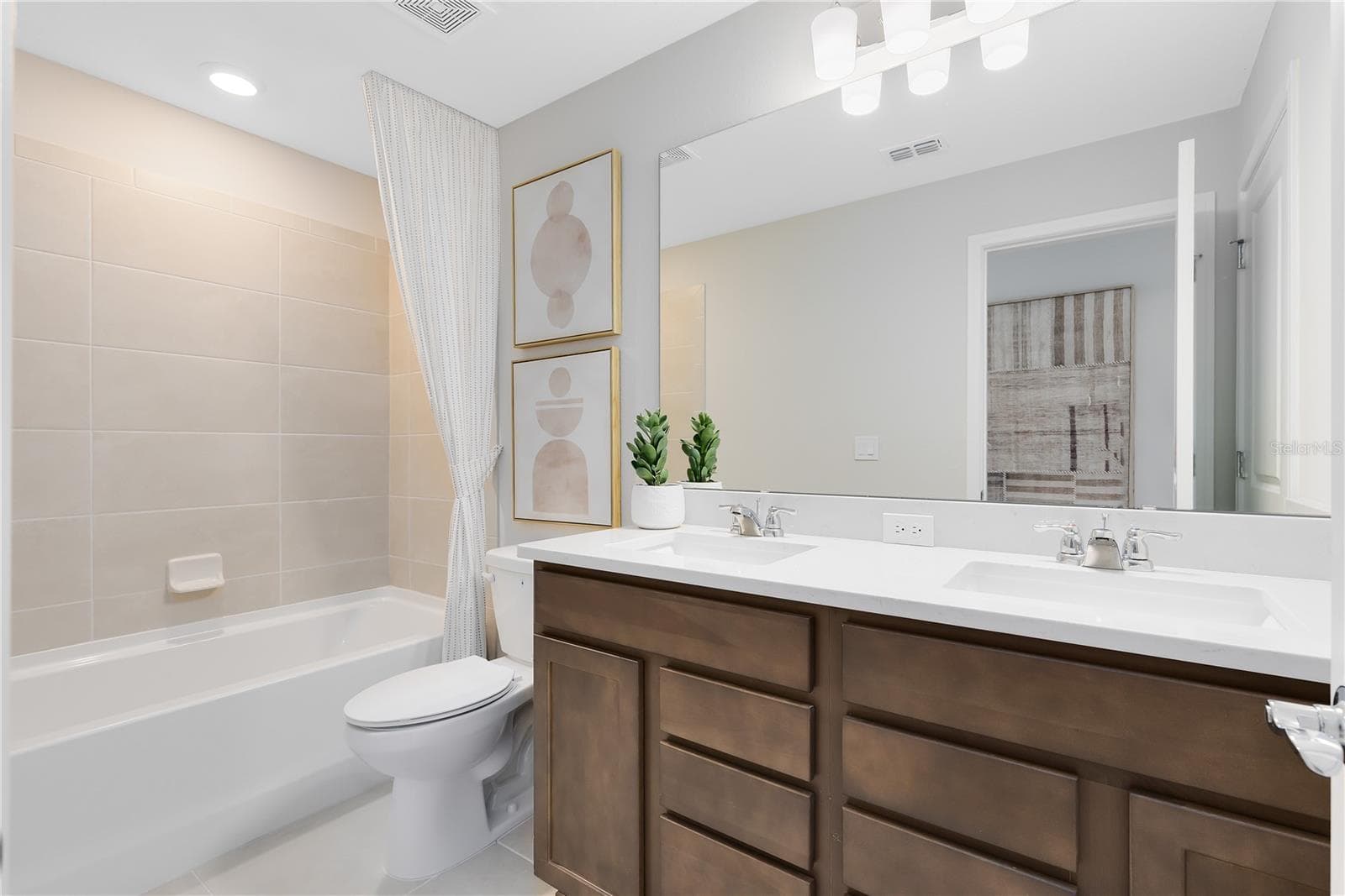 Model Home Design Only. Pictures and furnishings are for illustrative purposes only. Elevations, colors and options may vary. Furniture is for model home staging only. - 10674 EVENING STAR STREET, ORLANDO