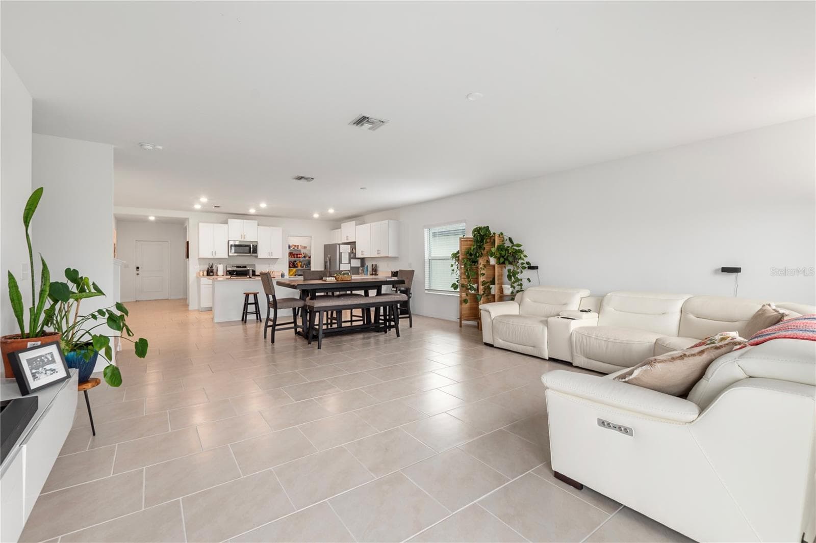 Open-concept great room designed for entertaining with abundant natural light and flexible living space. - 17177 MONTE ISOLA WAY, NORTH FORT MYERS