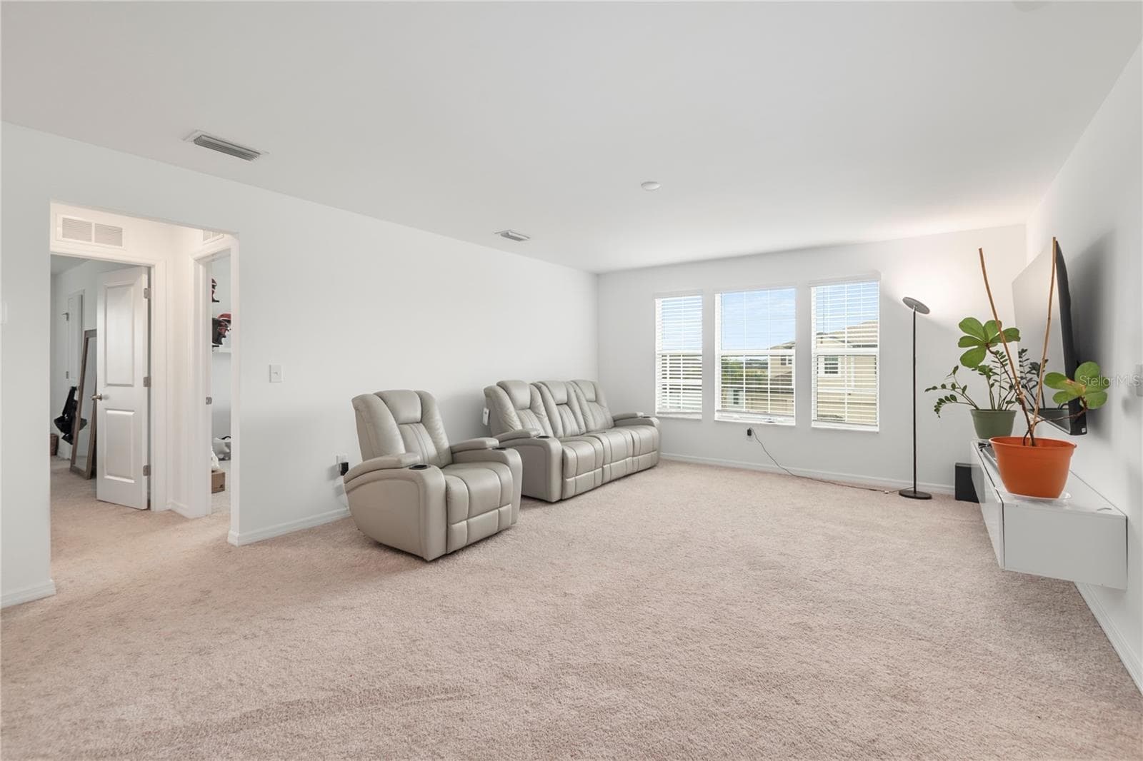 Expansive upstairs loft perfect for a media room, game room, fitness space, or second living area. - 17177 MONTE ISOLA WAY, NORTH FORT MYERS