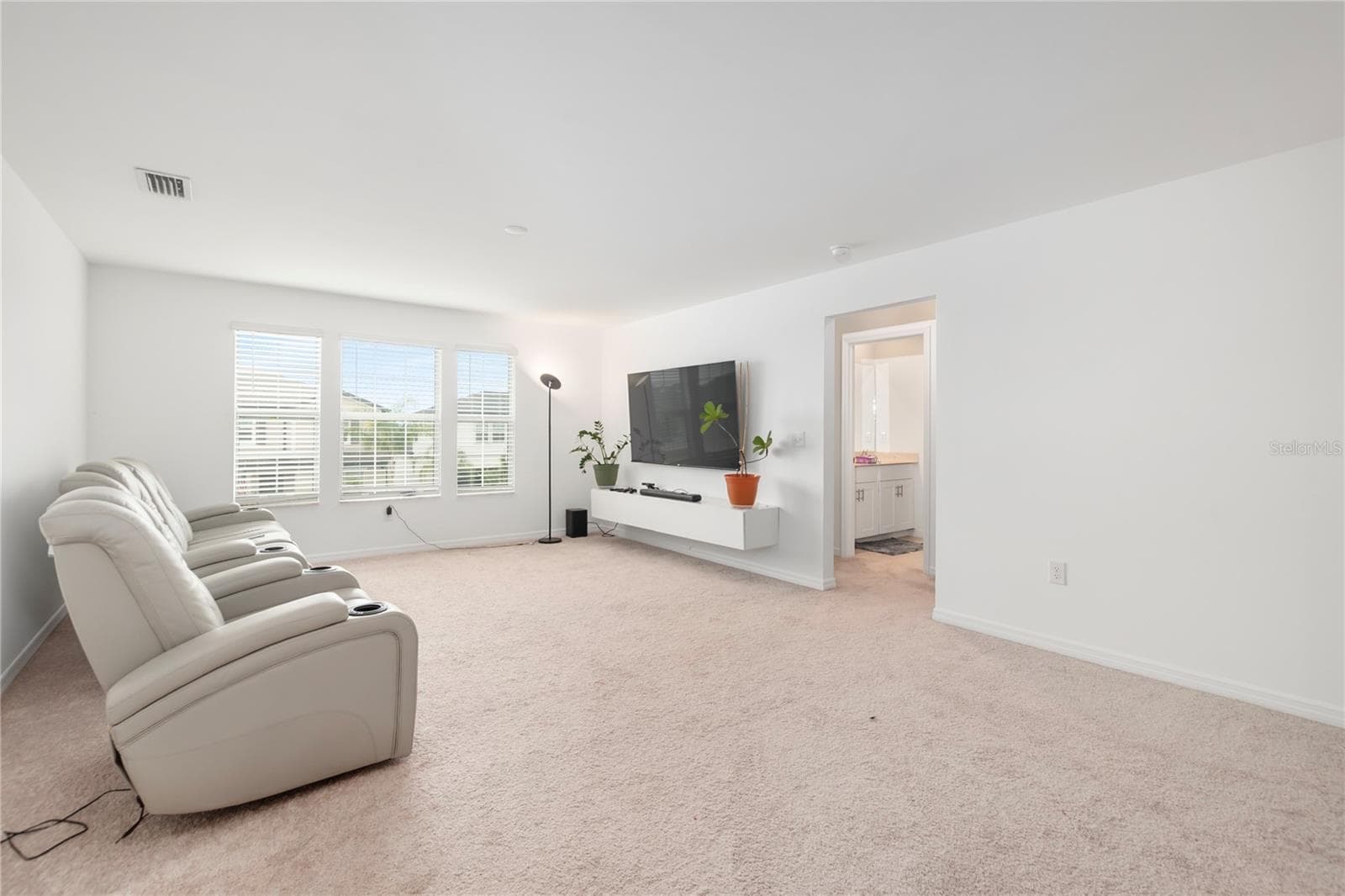 Expansive upstairs loft perfect for a media room, game room, fitness space, or second living area. - 17177 MONTE ISOLA WAY, NORTH FORT MYERS