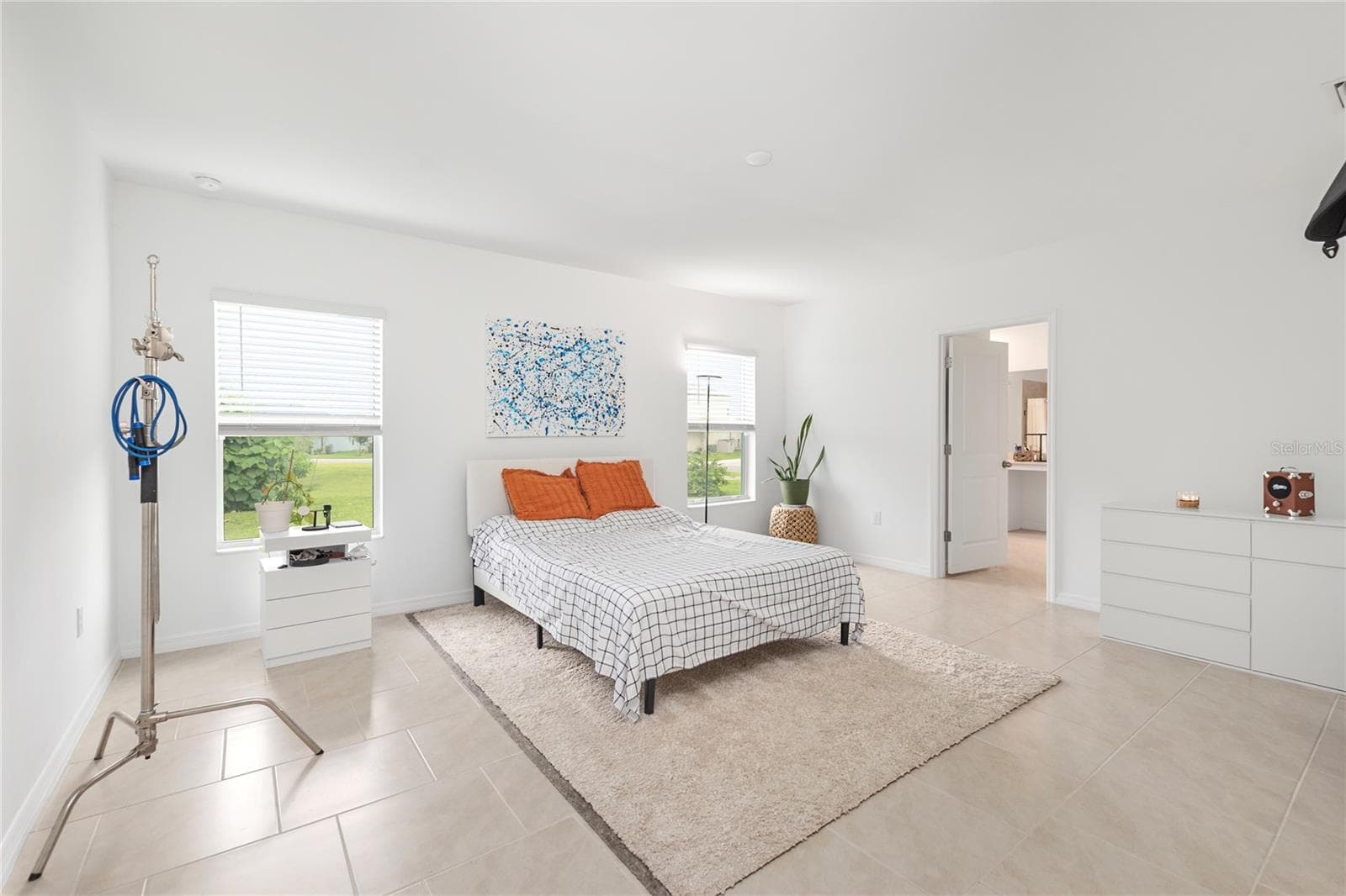Spacious primary suite with oversized windows, natural light, and room for a king-sized bedroom - 17177 MONTE ISOLA WAY, NORTH FORT MYERS