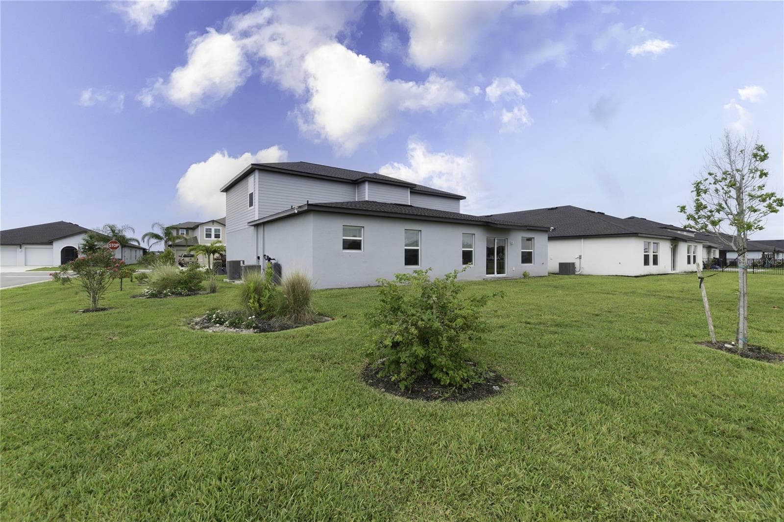 Expansive backyard with room to build a custom pool, outdoor kitchen, and entertaining space. - 17177 MONTE ISOLA WAY, NORTH FORT MYERS