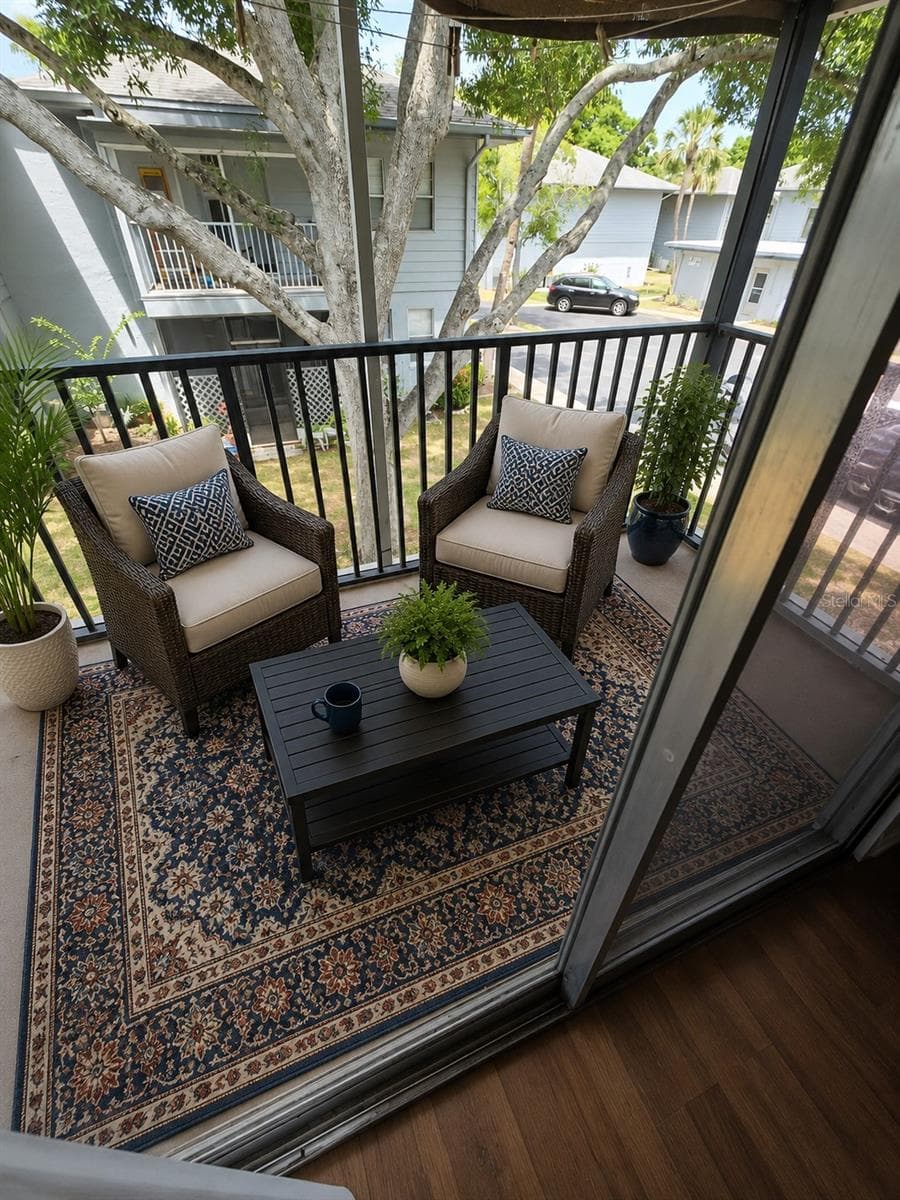 Staged balcony, is screened in. - 10800 US HIGHWAY 19 N #237, PINELLAS PARK