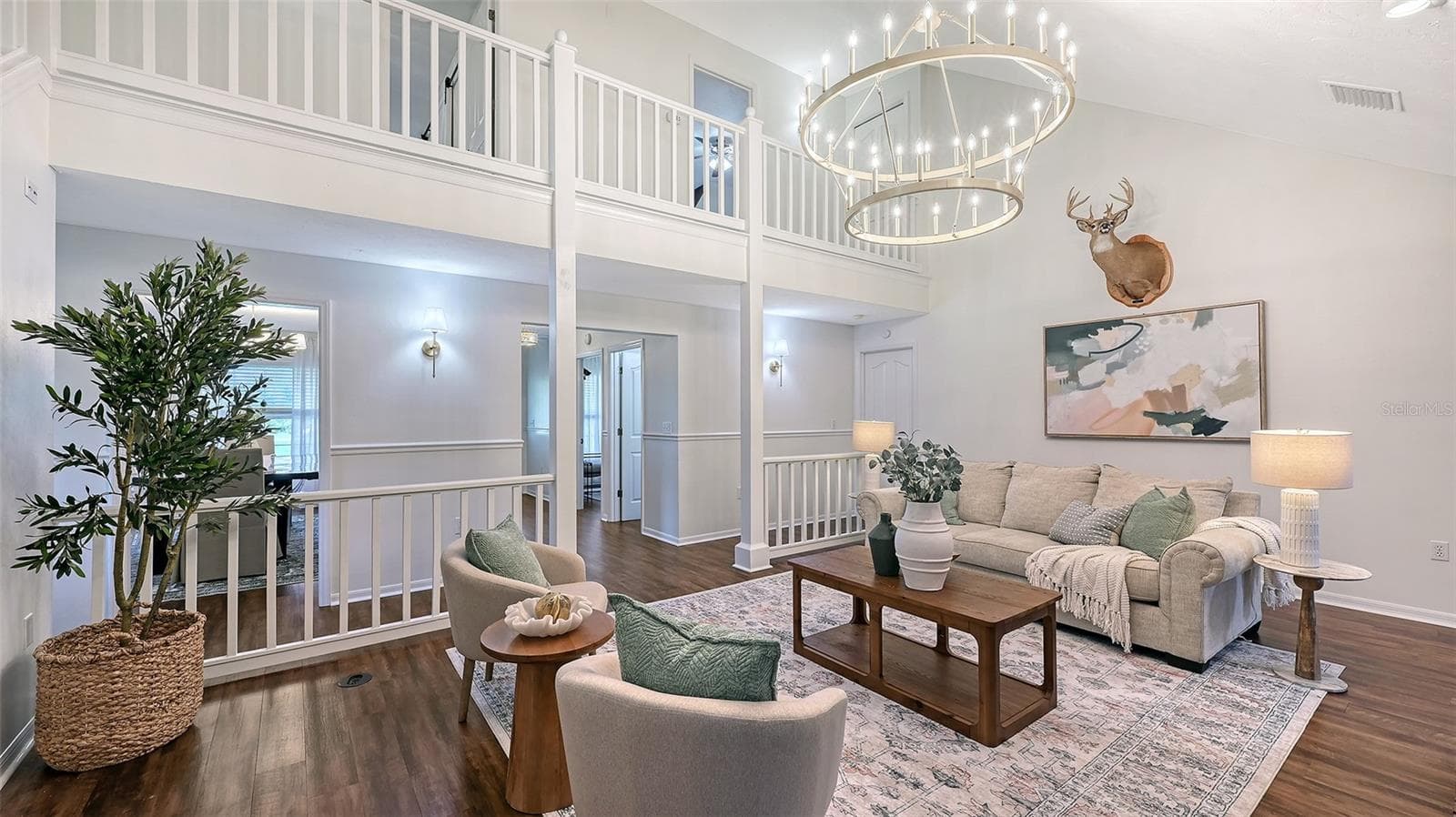 Living Room with Second Floor View of Balcony - 28401 104TH DR E, MYAKKA CITY