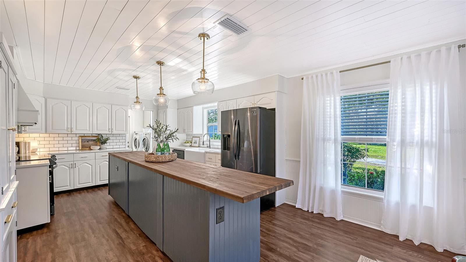 Kitchen with Impressive Island - 28401 104TH DR E, MYAKKA CITY