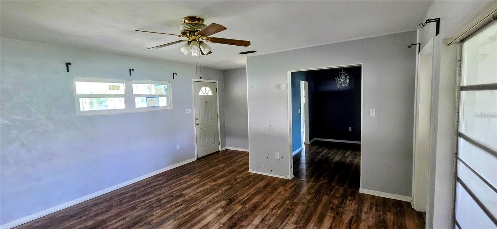 Living Room with entrance to Dining Room - 204 BOBBIE CIR, LAKELAND