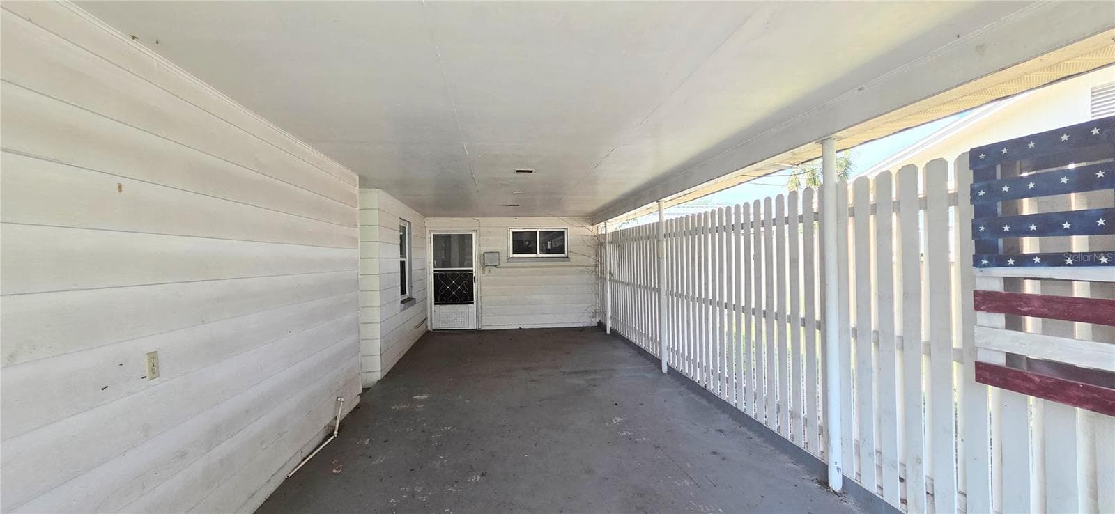 Carport 2 with entrance to Bonus Room - 204 BOBBIE CIR, LAKELAND