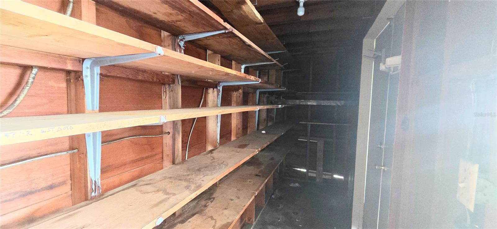 Inside storage closet off Carport 1 - 204 BOBBIE CIR, LAKELAND