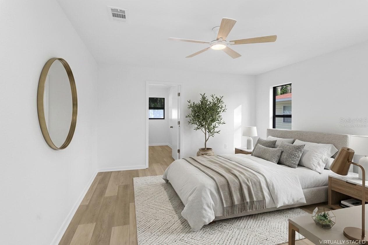 Virtually Staged. Primary Bedroom with Ensuite. - 4949 PLEASANT HOLLOW TRL #211, LAKELAND