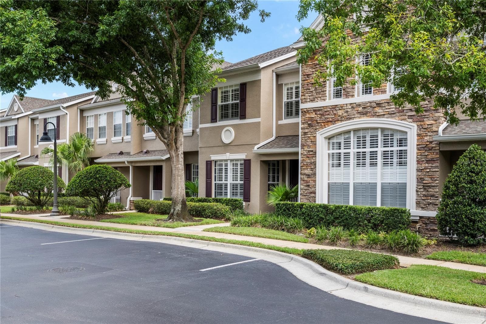 Front view with ample guest parking - 573 SHINING ARMOR LN, LONGWOOD