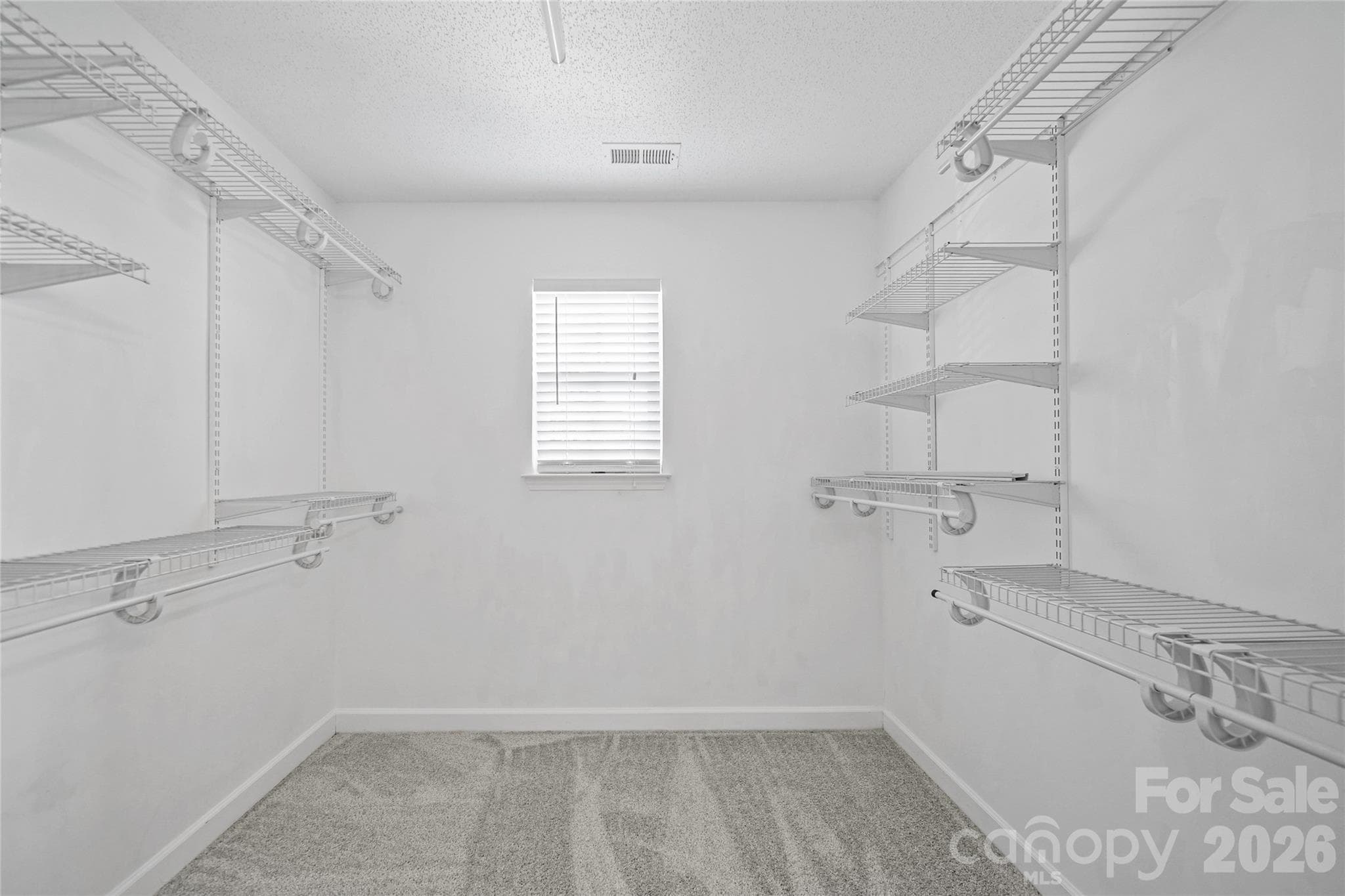 master walk in closet - 9233 Simonton Drive, Charlotte
