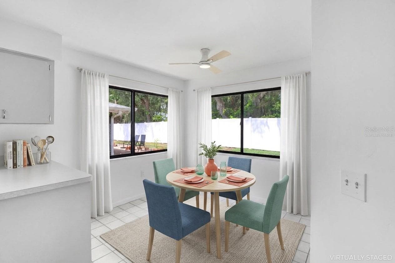 Virtually Staged. Dinette and Kitchen Counter. - 4949 PLEASANT HOLLOW TRL #211, LAKELAND