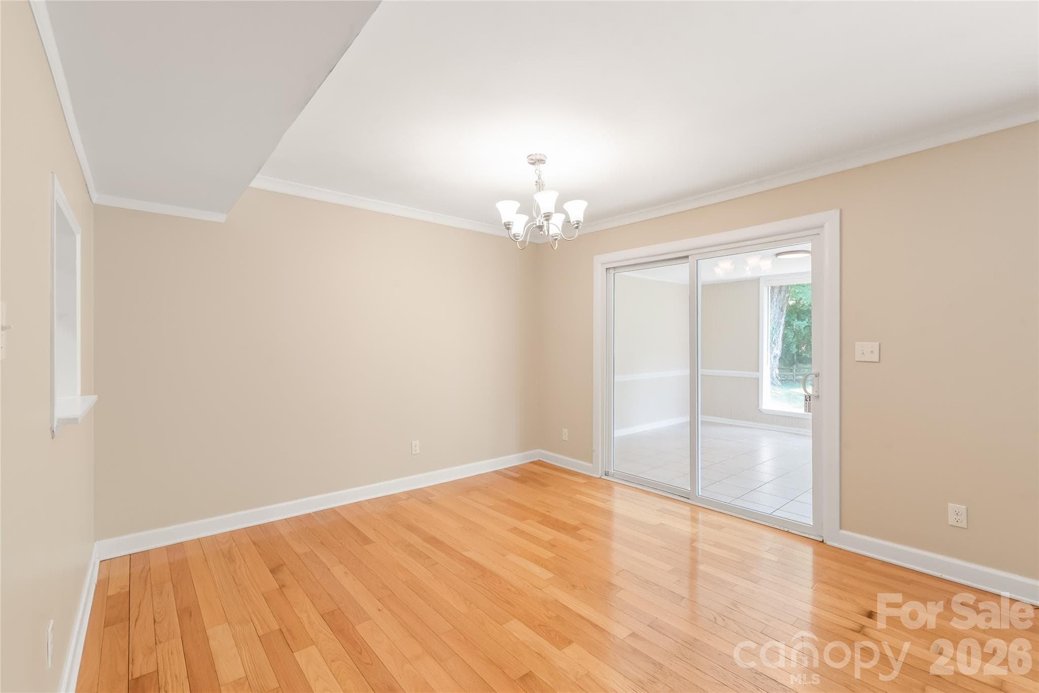 Dining Room w/ slider to Sunroom - 8410 Cricket Lake Drive, Charlotte
