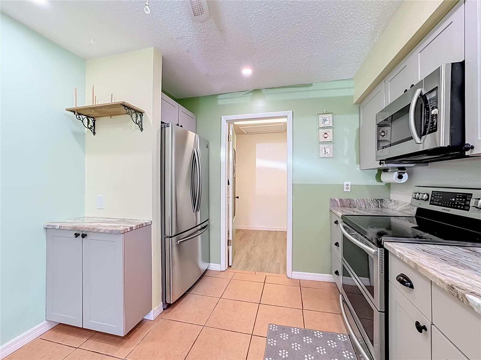 updated kitchen area - 4190 66TH STREET CIR W #O, BRADENTON