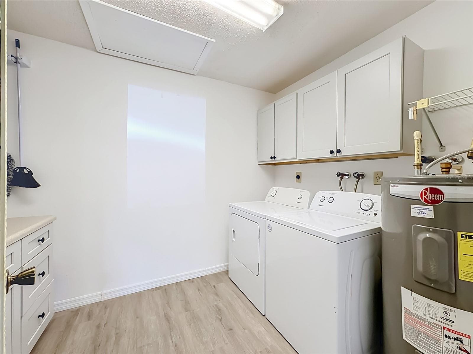 Laundry room with full size washer and dryer - 4190 66TH STREET CIR W #O, BRADENTON