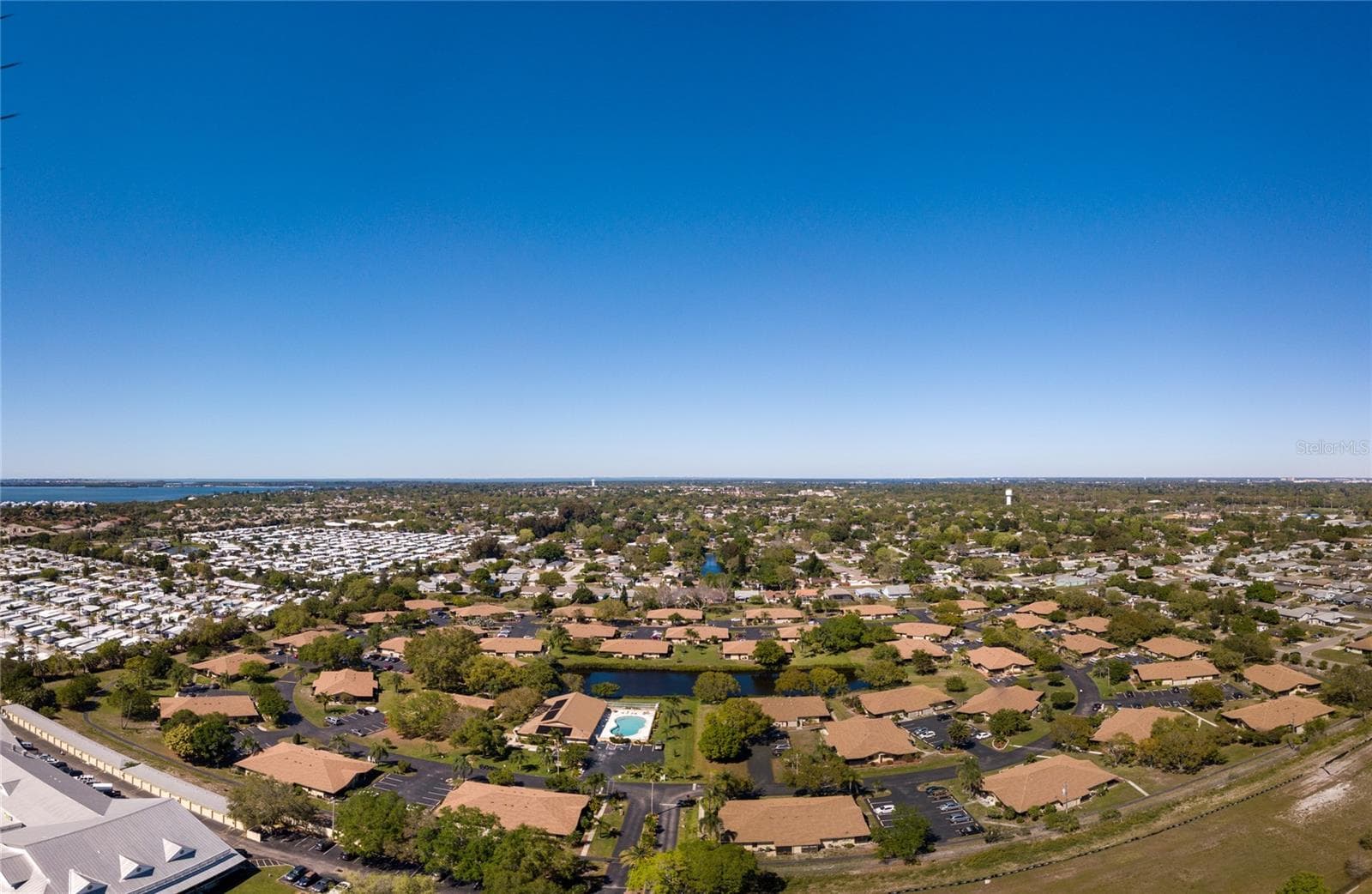View of the community with walking trail all the way around it. - 4190 66TH STREET CIR W #O, BRADENTON