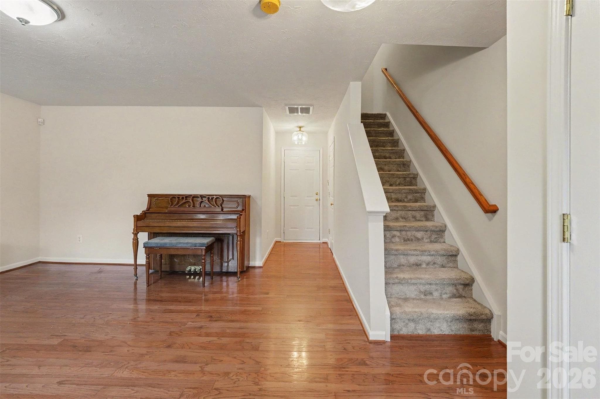 1st floor entry in formal living or great flex space - Matthews