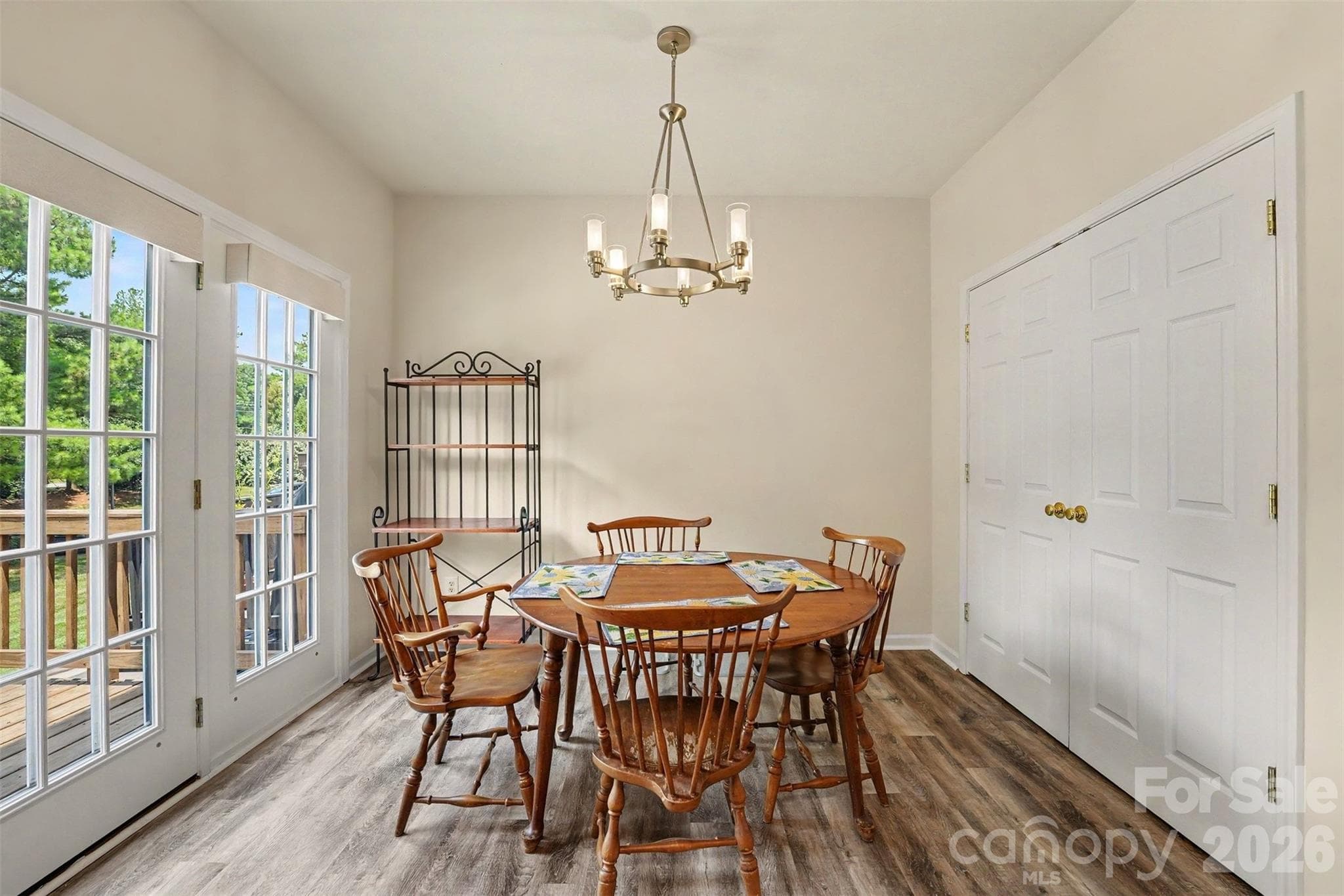 2nd floor dining area with entry door out to the deck - Matthews