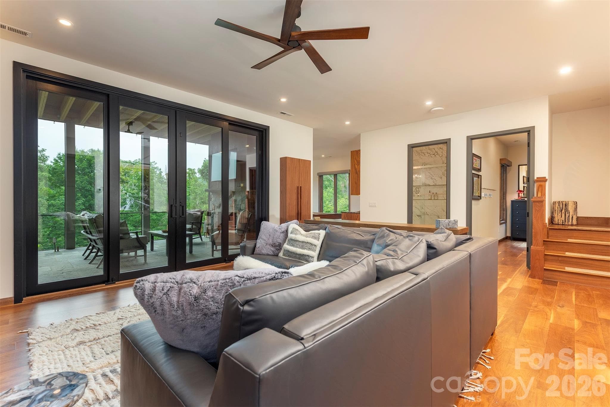 Lower level media room with walk out screened deck with fireplace - Asheville