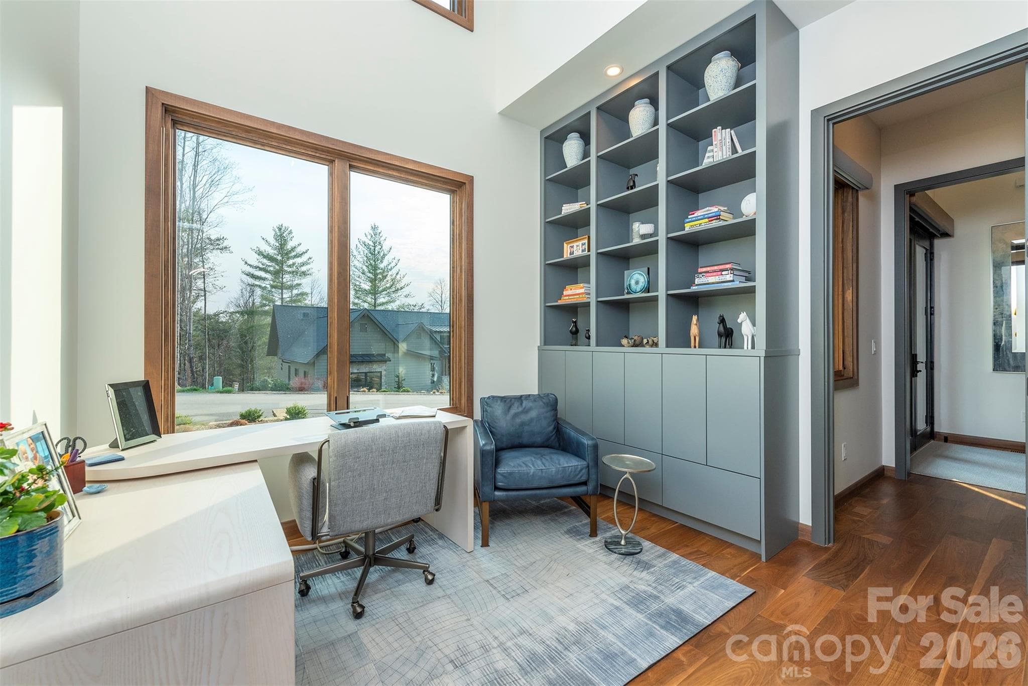 4th bedroom or Den/Office complete with built ins and automatic blinds have been added - Asheville