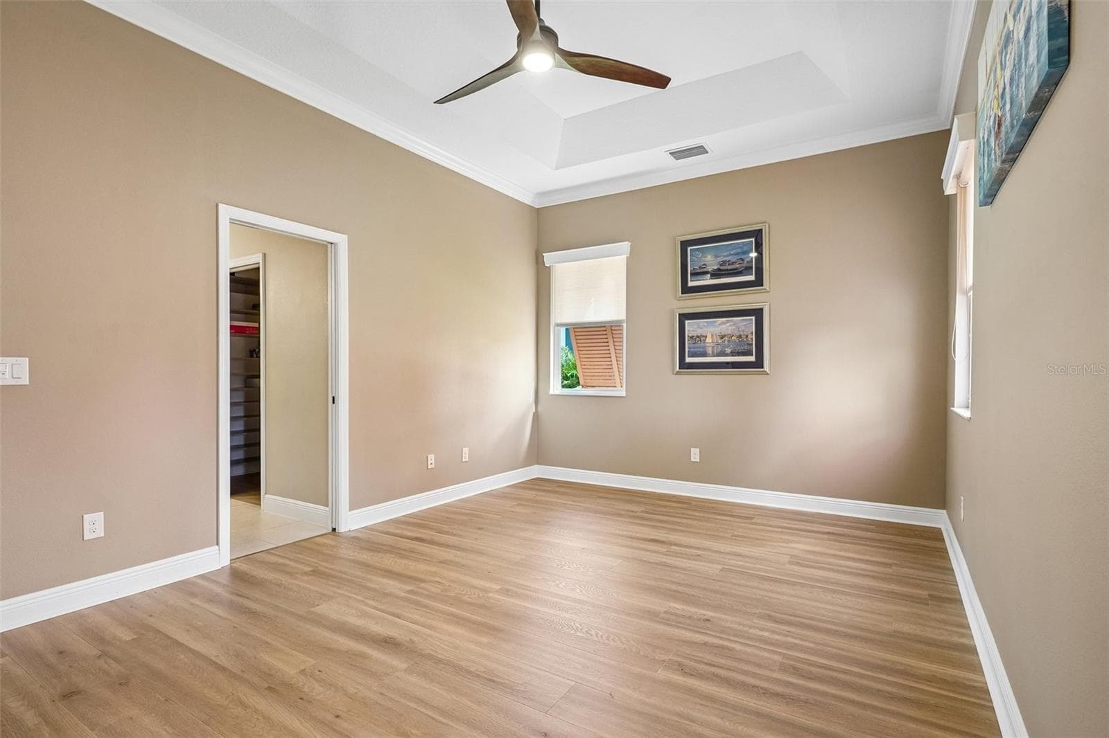 Primary Bedroom with Ensuite Bathroom - 1212 FIESTA KEY CIR, LADY LAKE