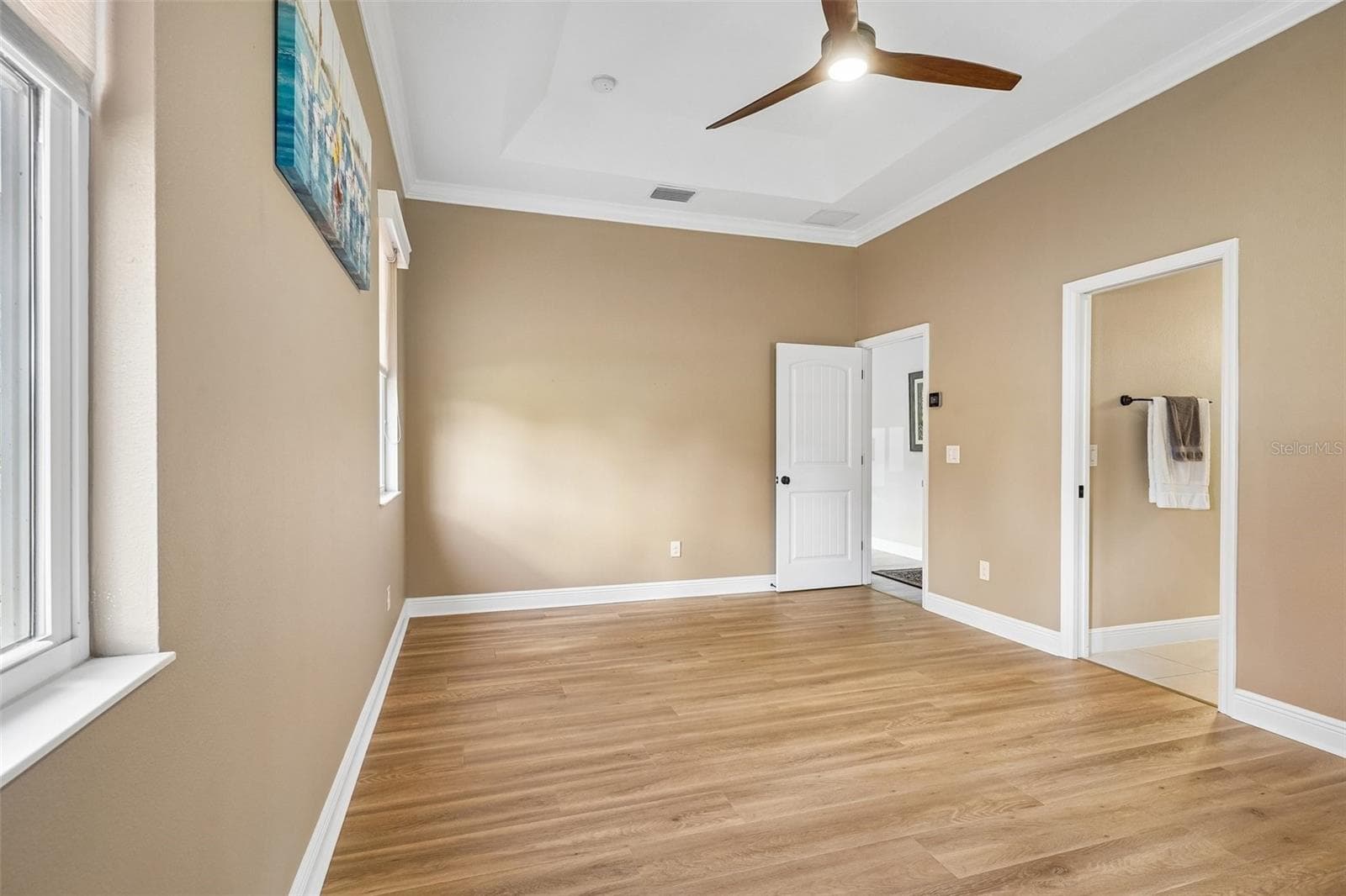 Primary Bedroom with Ensuite Bathroom - 1212 FIESTA KEY CIR, LADY LAKE