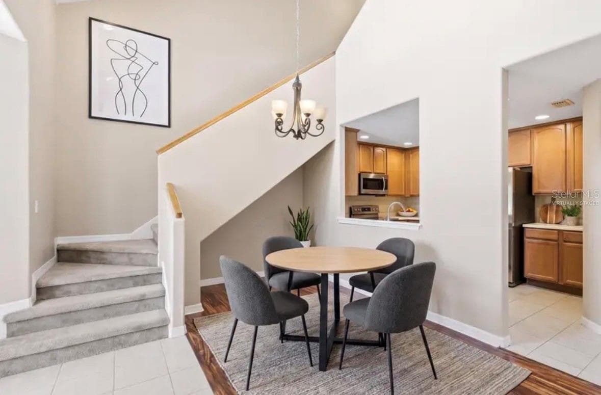 Virtually staged-dining area - 316 NAUTICA MILE DR, CLERMONT