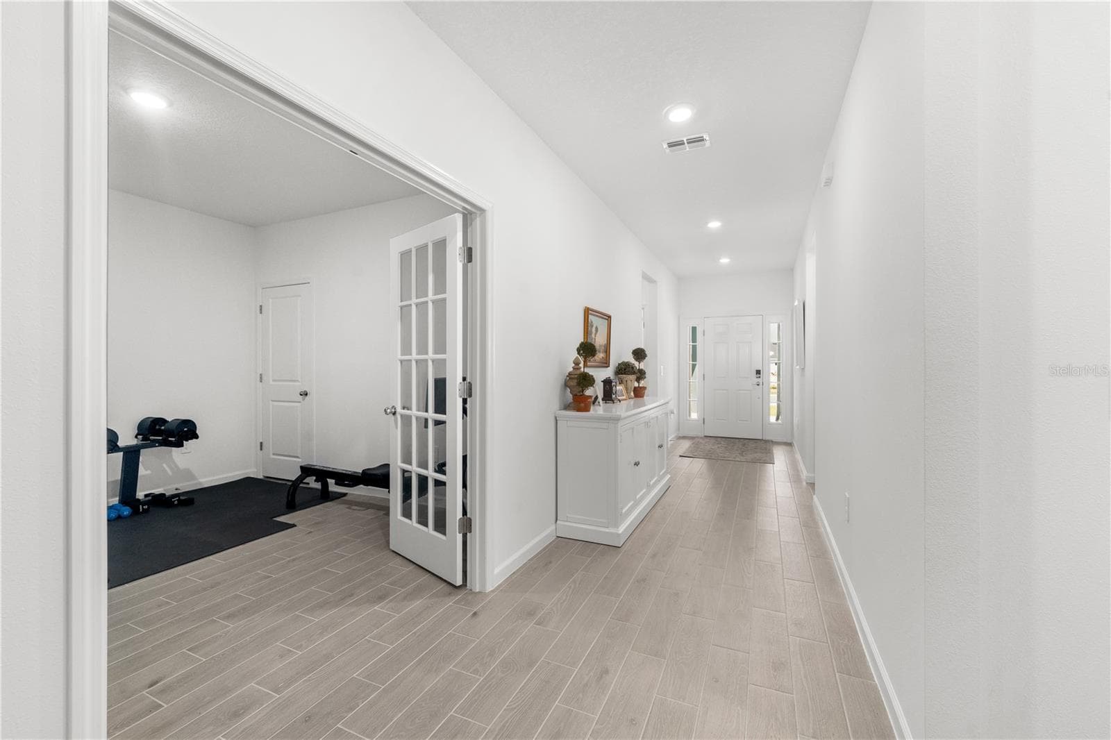 Large Entry Foyer And French Doors to Flex Space - 13941 NW CONVERGENCE BLVD, ALACHUA