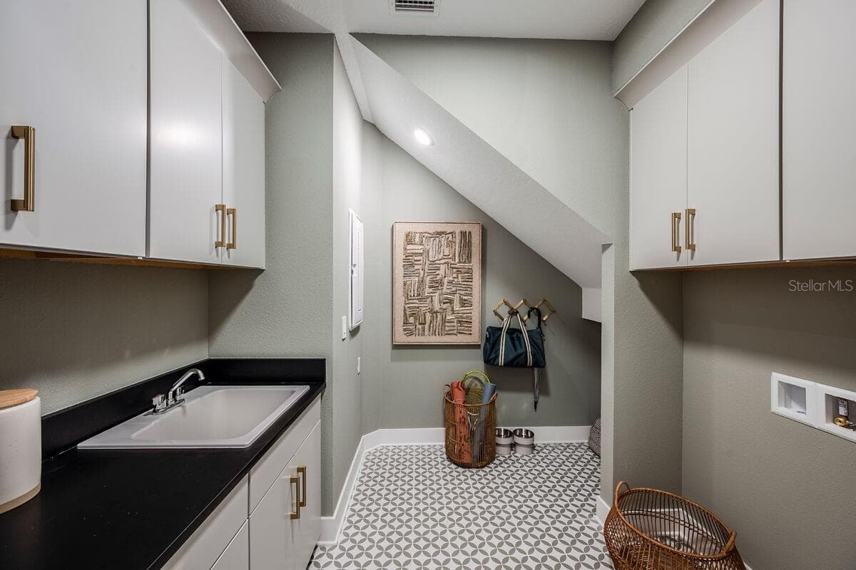 Laundry Room-Pictures are of Model Home for representational purposes only. - 13694 LOREDO WAY, PUNTA GORDA