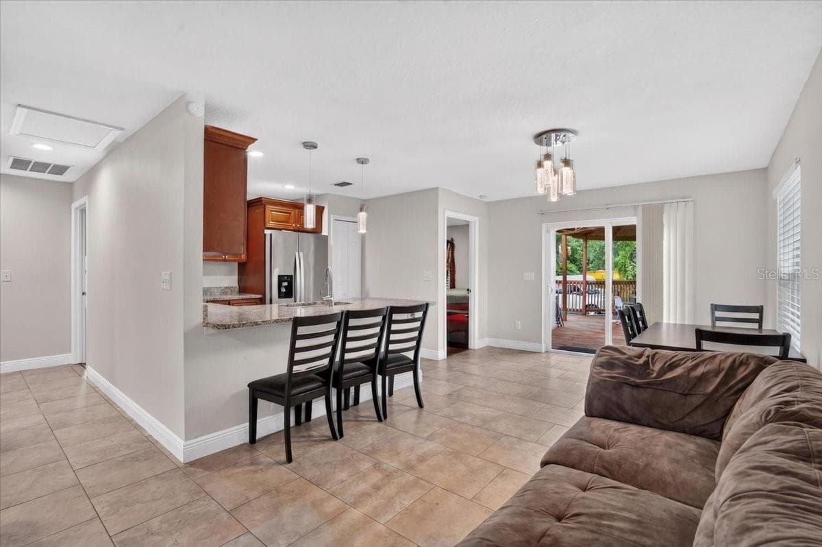 Single Family Residence at 1607 E LINEBAUGH AVE, TAMPA, photo 5 of 17