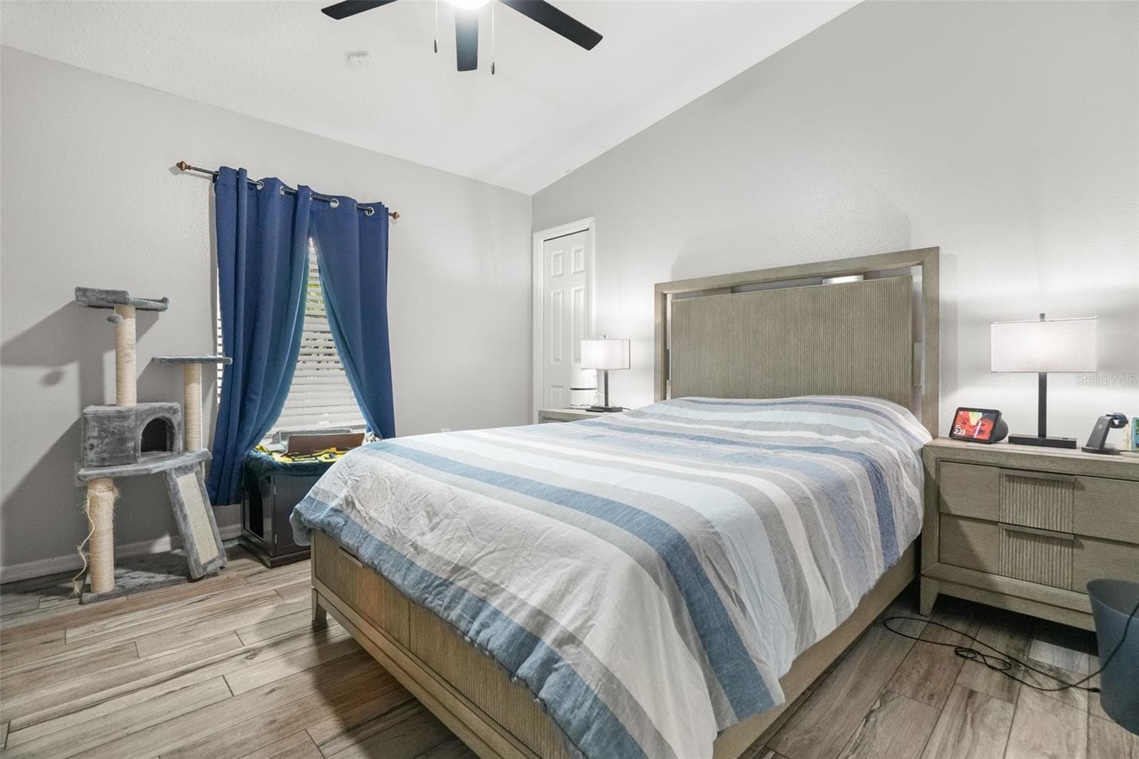 2nd bedroom with volume ceilings and upgraded tile flooring. - 2117 LARKSPUR CT, TRINITY