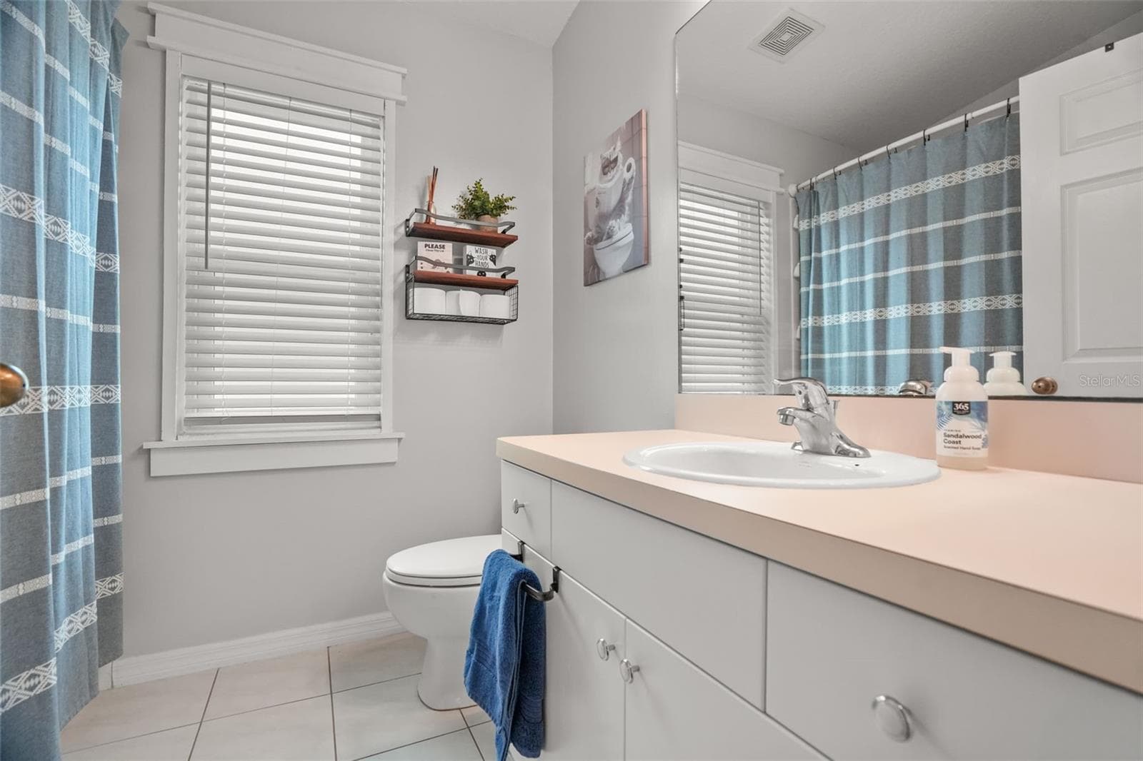 2nd bathroom off kitchen with shower and tub combo - 2117 LARKSPUR CT, TRINITY