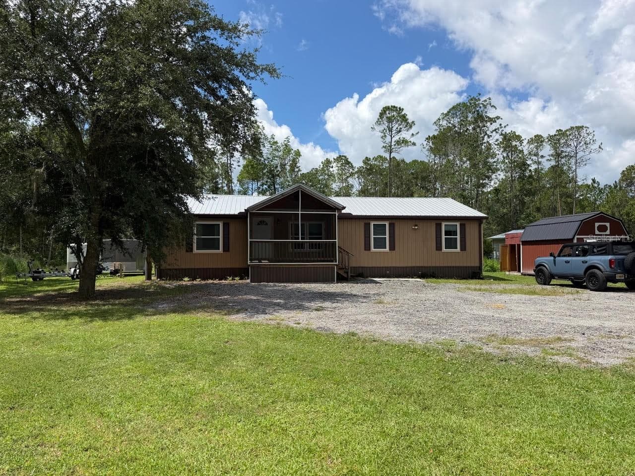 Manufactured Home at 5171 MAHOGANY BLVD, BUNNELL, photo 3 of 29