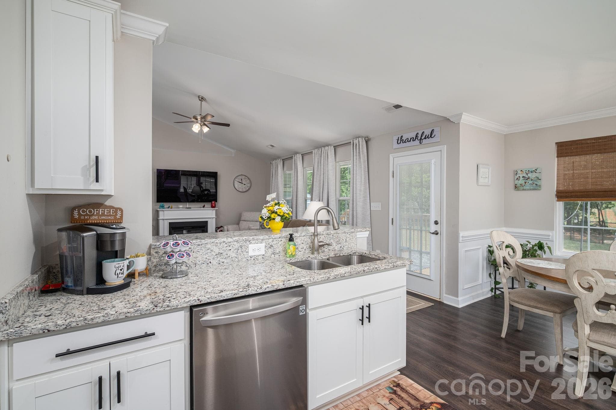 Open kitchen to living area creates an interactive social space - Newton