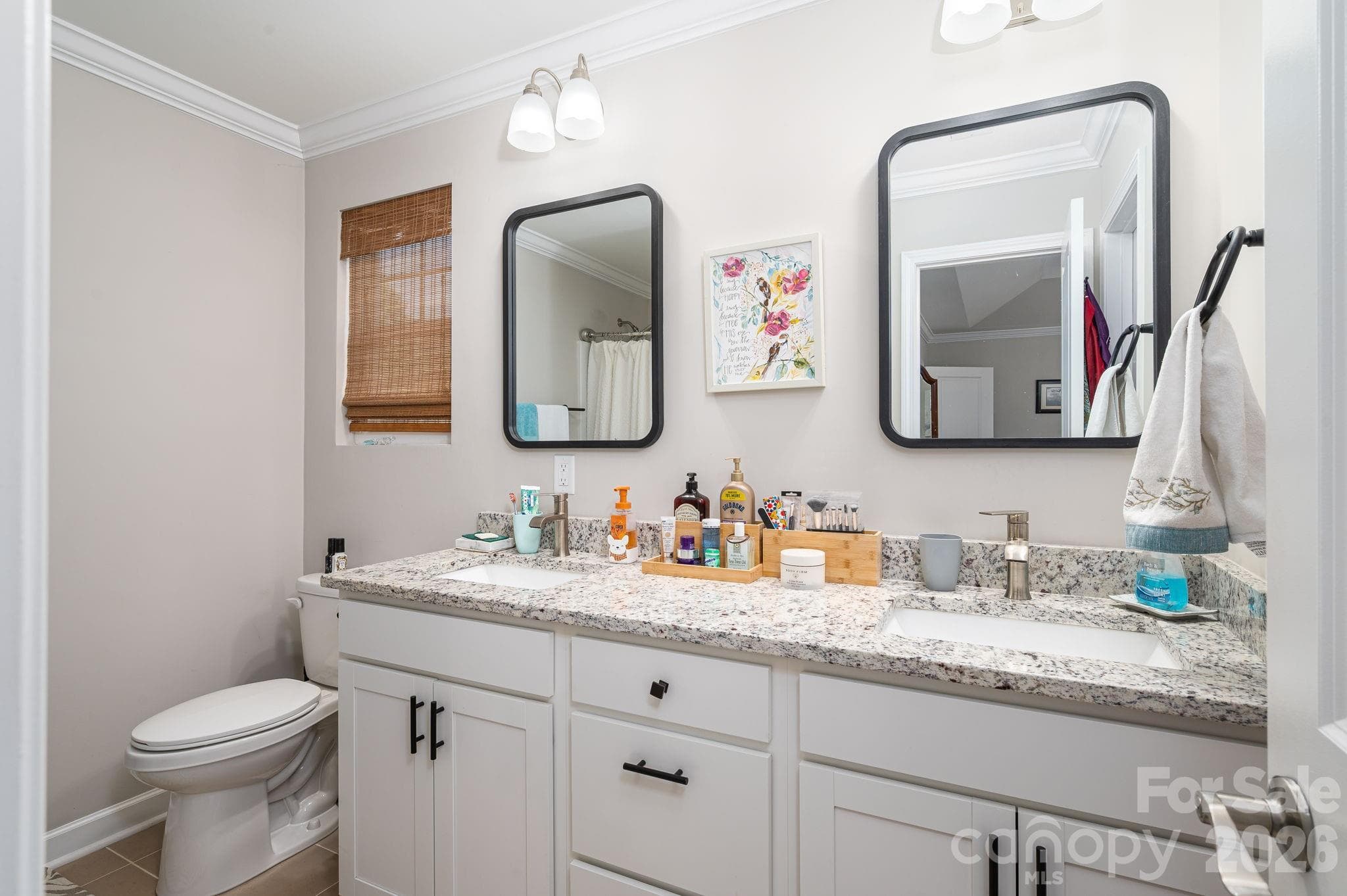 Double vanity sinks with granite countertops in Primary Bath - Newton