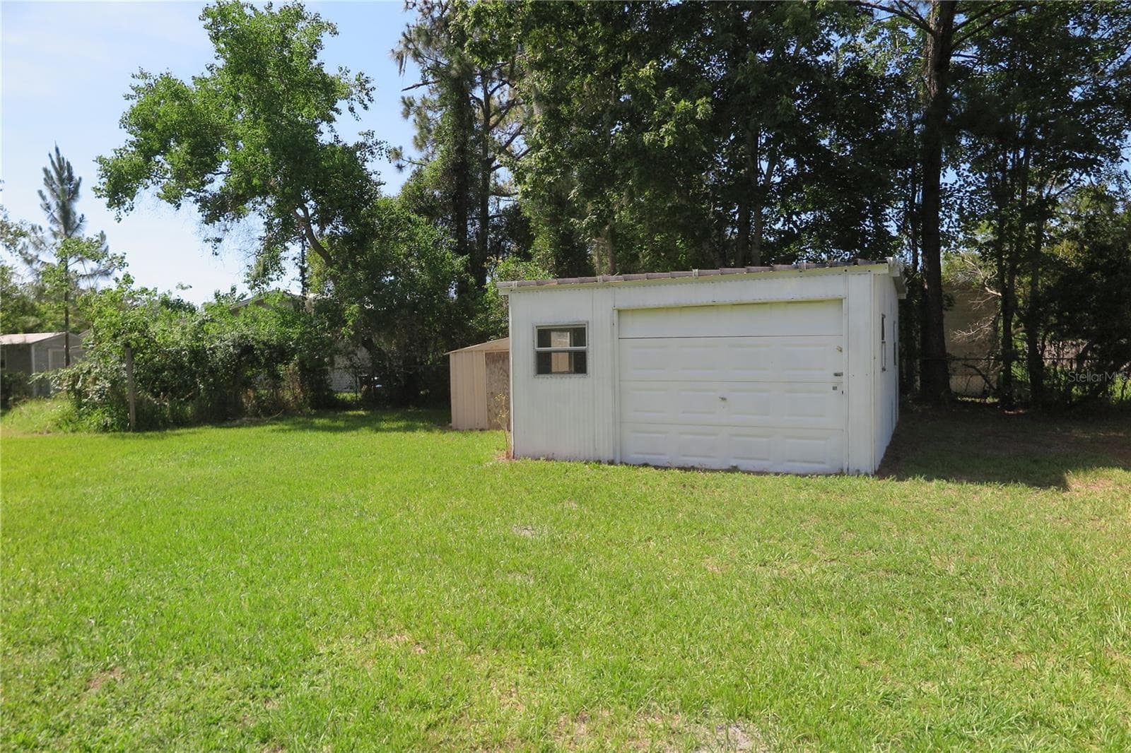 Manufactured Home at 108 PINESHORE DR, SATSUMA, photo 7 of 34