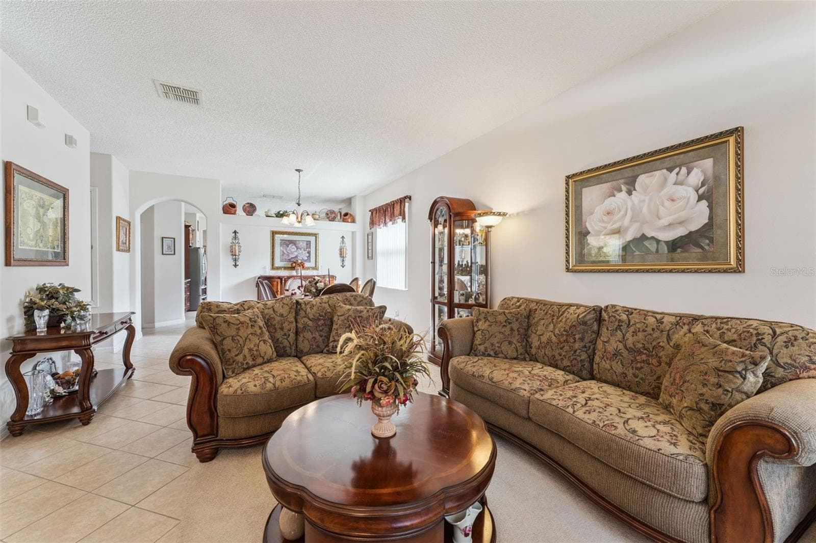 Living Room with Dining Room View - 9955 MEDALLION BLUFF LN, ORLANDO