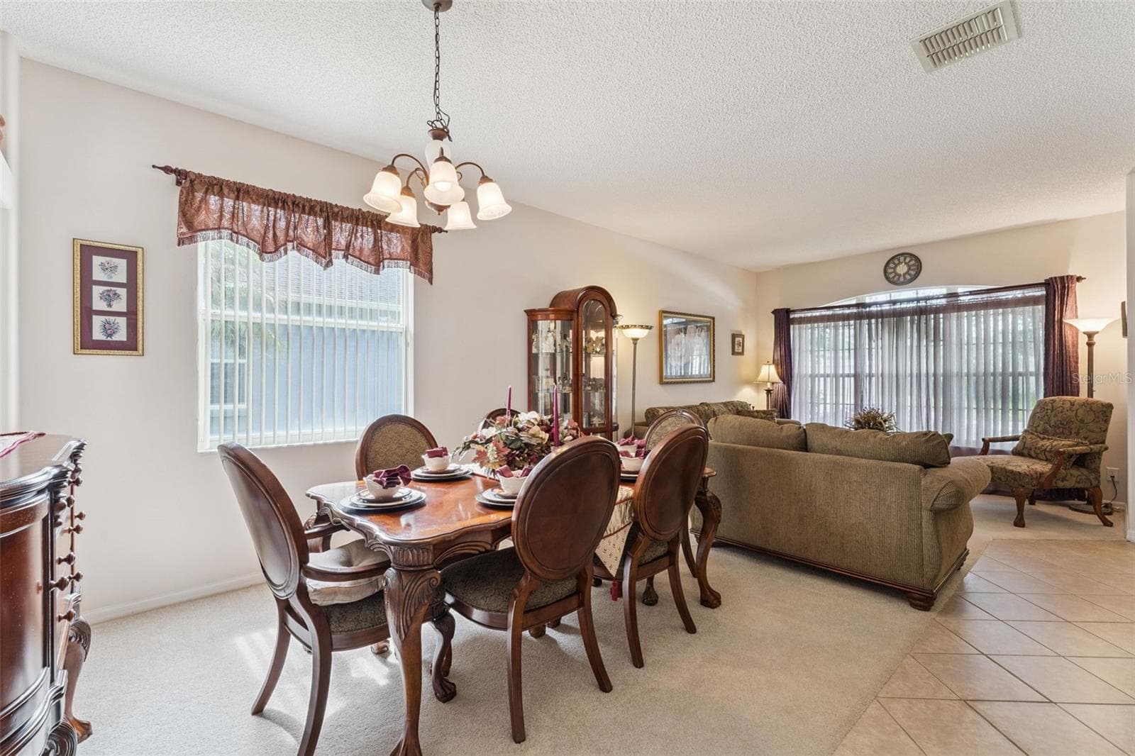 Dining Room with Living Room View - 9955 MEDALLION BLUFF LN, ORLANDO