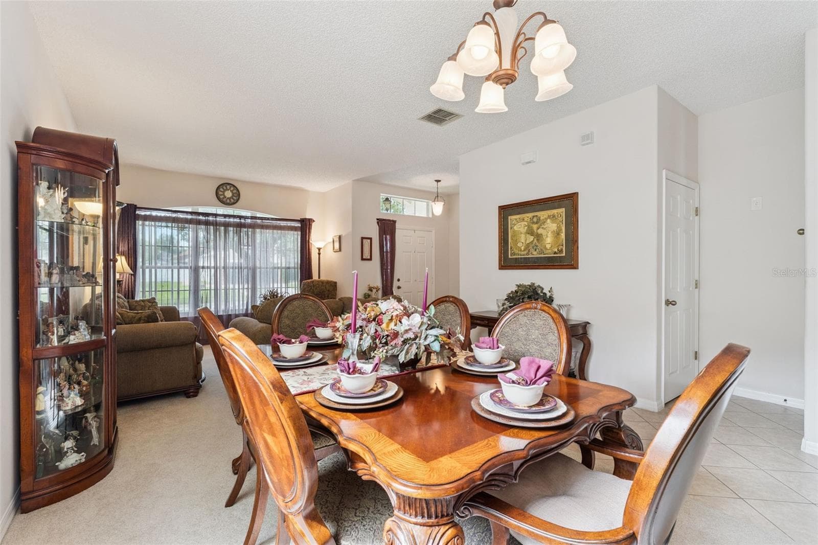 Dining Room with Living Room View - 9955 MEDALLION BLUFF LN, ORLANDO